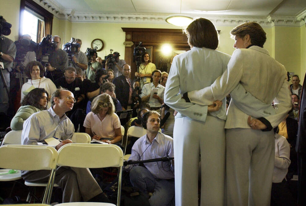 Lead plaintiff couple Julie, left, and Hillary Goodridge speak to the media after their marriage ceremony at the Unitarian Universalist church during the first day of state-sanctioned gay marriage in the United States Monday, May 17, 2004. (Elise Amendola/AP)
