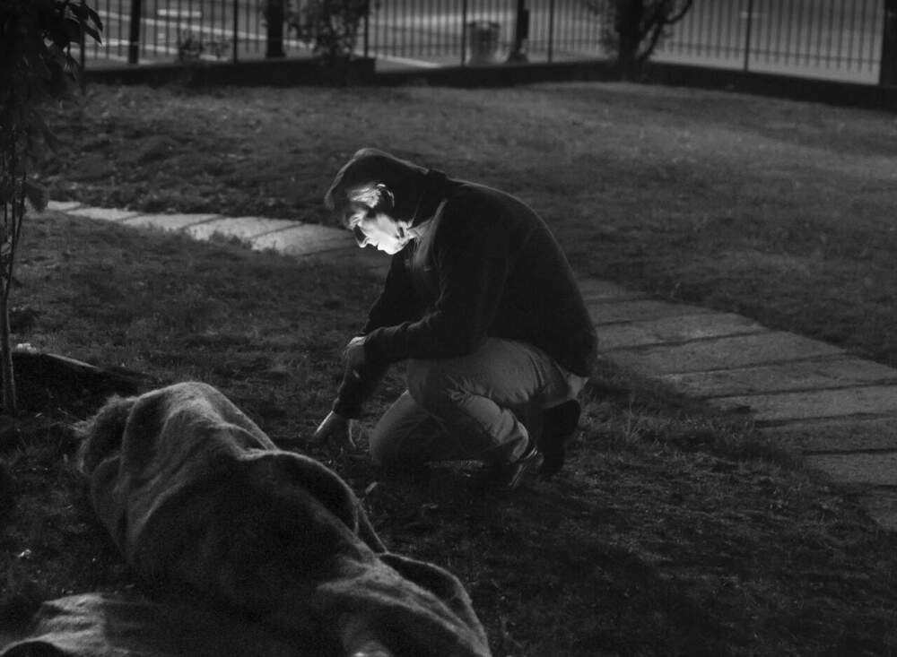 Jim O'Connell tends to a patient. (Photo by Bill Brett/Courtesy BHCHP)