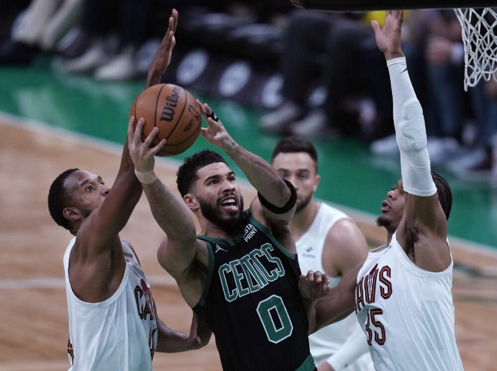 Boston Celtics forward Jayson Tatum (0) drives to the basket against the Cleveland Cavaliers during the first half of Game 5 of an NBA basketball second-round playoff series. (Charles Krupa/AP)
