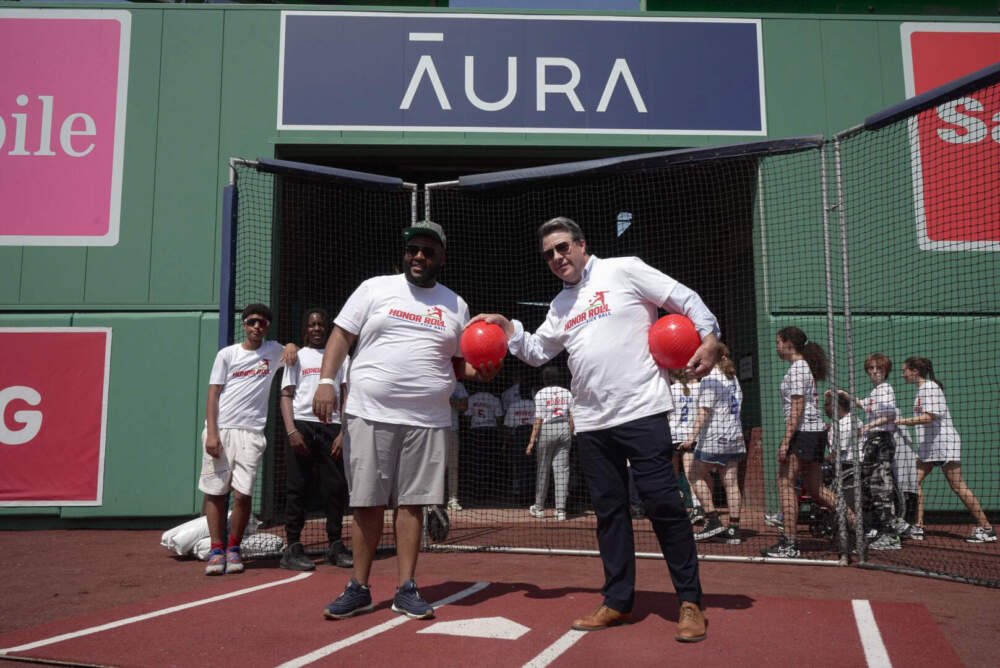 Massachusetts Representatives Christopher Worrell and Dan Ryan at Fenway Park hosts the first-ever kickball game with students from Dorchester, Roxbury and Charlestown at Fenway Park. (Sydney Ko/WBUR)