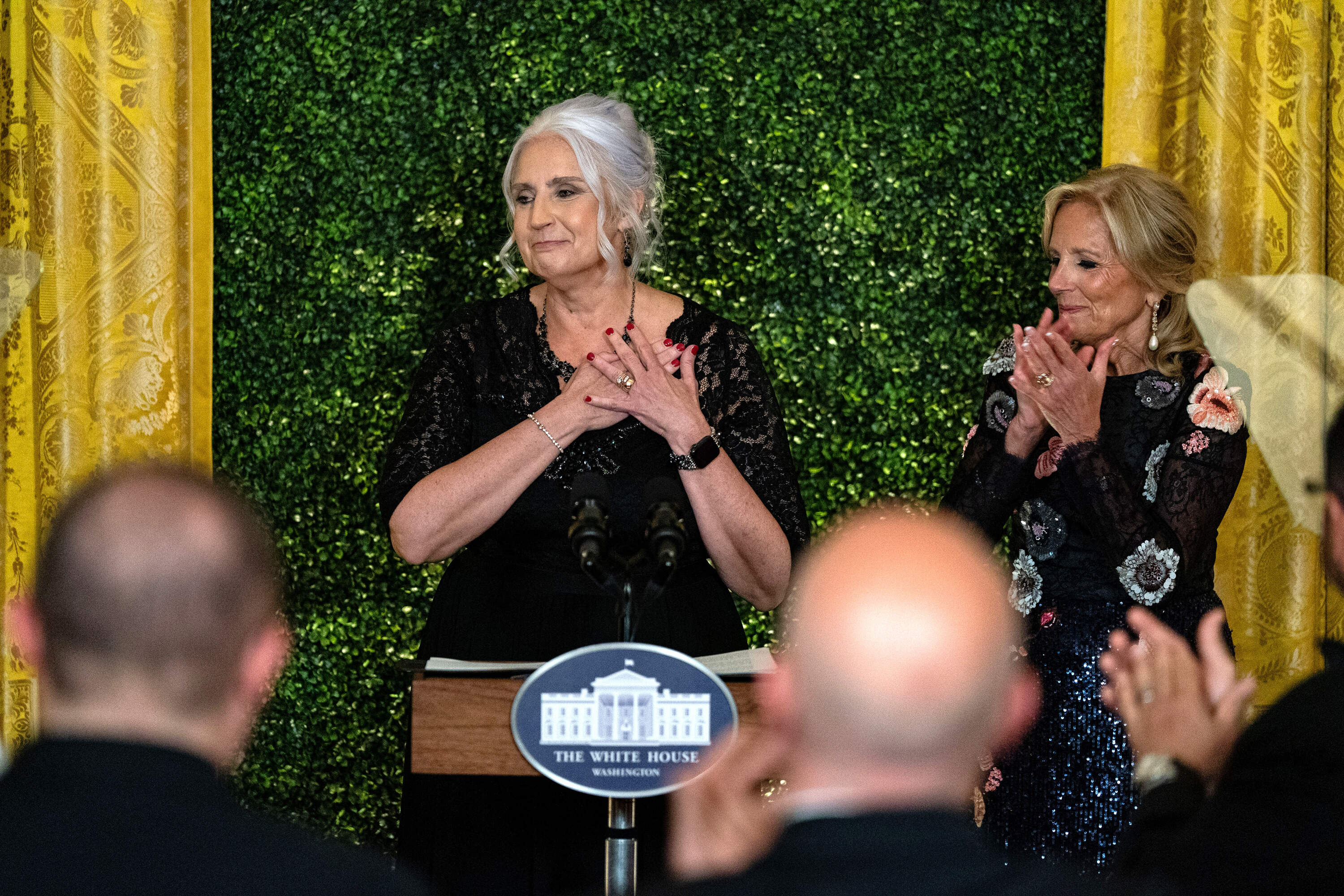 Missy Testerman, 2024 National Teacher of the Year, reacts as first lady Jill Biden looks on during the "Teachers of the Year" State Dinner. (Kent Nishimura/Getty Images)