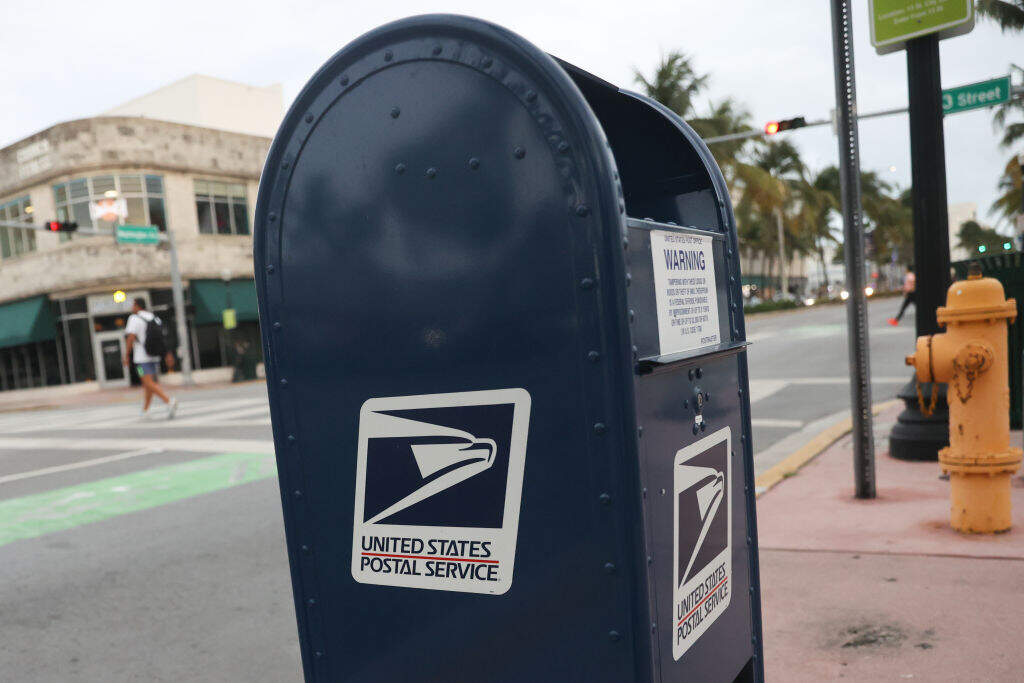 United States Postal Service mailbox is seen in Miami Beach, United States on April 30, 2024. (Jakub Porzycki/NurPhoto via Getty Images)