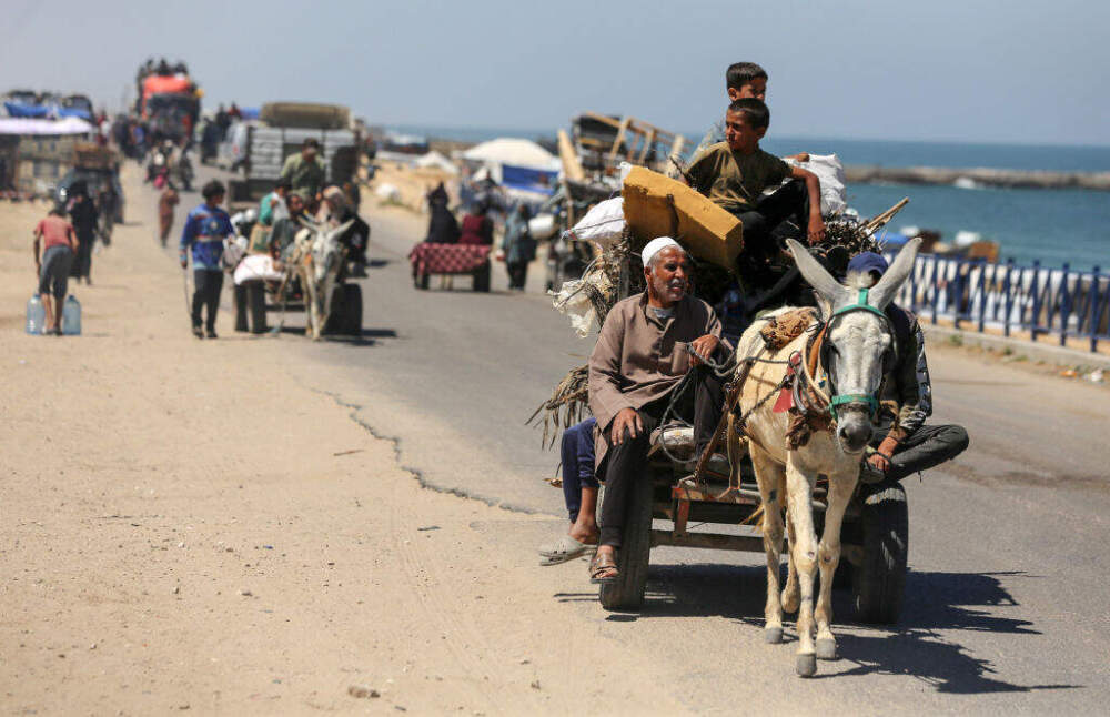 Palestinians are fleeing Rafah as Israeli forces launch a ground and air operation in the eastern part of the southern Gaza city, amid the ongoing conflict between Israel and Hamas, in Deir el-Balah in the central Gaza Strip, on May 8, 2024. (Majdi Fathi/NurPhoto via Getty Images)