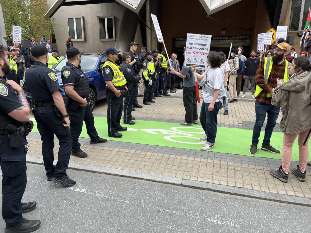 Protesters and police at MIT on Thursday afternoon.  (Barbara Moran/WBUR)