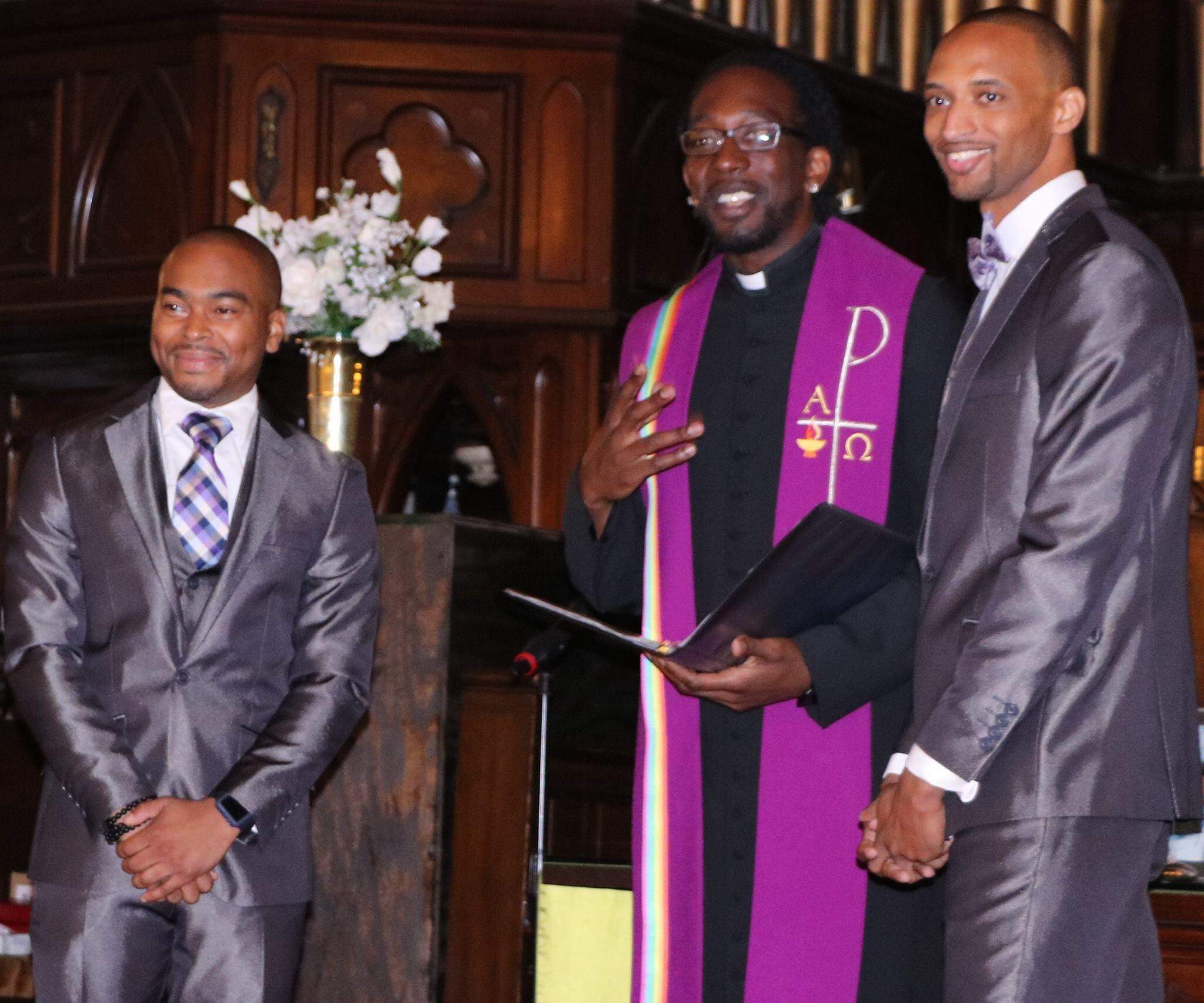 Quincey J. Roberts and Corey Yarbrough during their wedding ceremony at Union United Methodist Church on Oct. 1, 2016. (Courtesy)