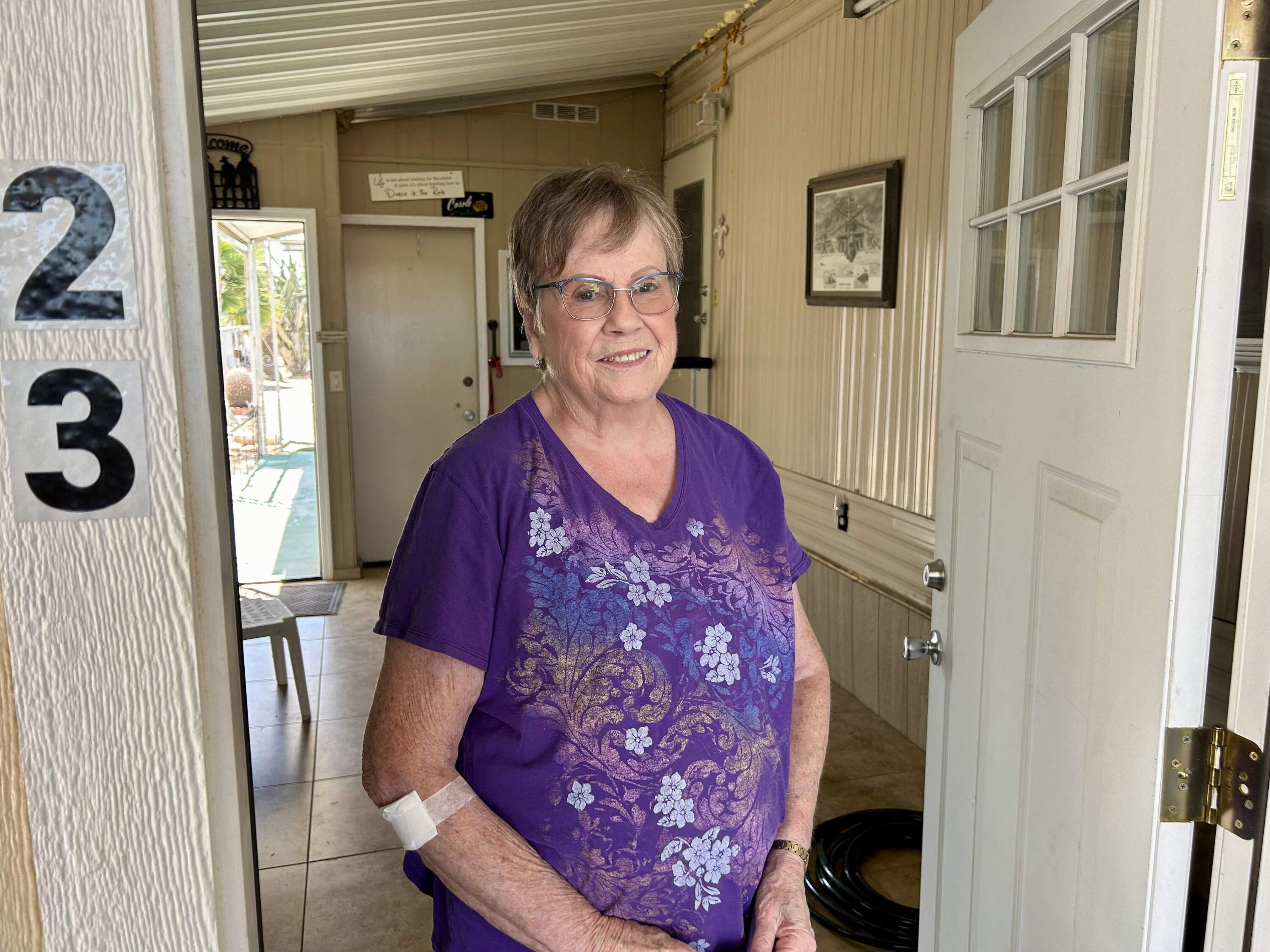 Carole Ann Kane, 82, moved into her mobile home in Mesa, Arizona in January. It did not have an air conditioning unit and Kane felt a sense of urgency to find a solution before summer temperatures soared. (Peter O'Dowd/Here &amp; Now)