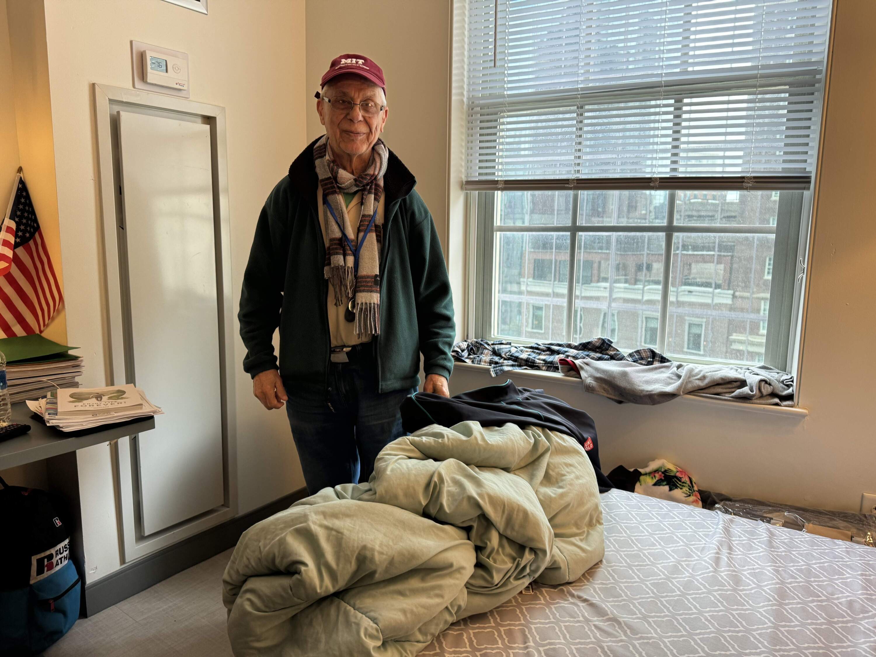 Jack Koutoujian, in his studio apartment at 140 Clarendon Street in Back Bay. (Walter Wuthmann/WBUR)