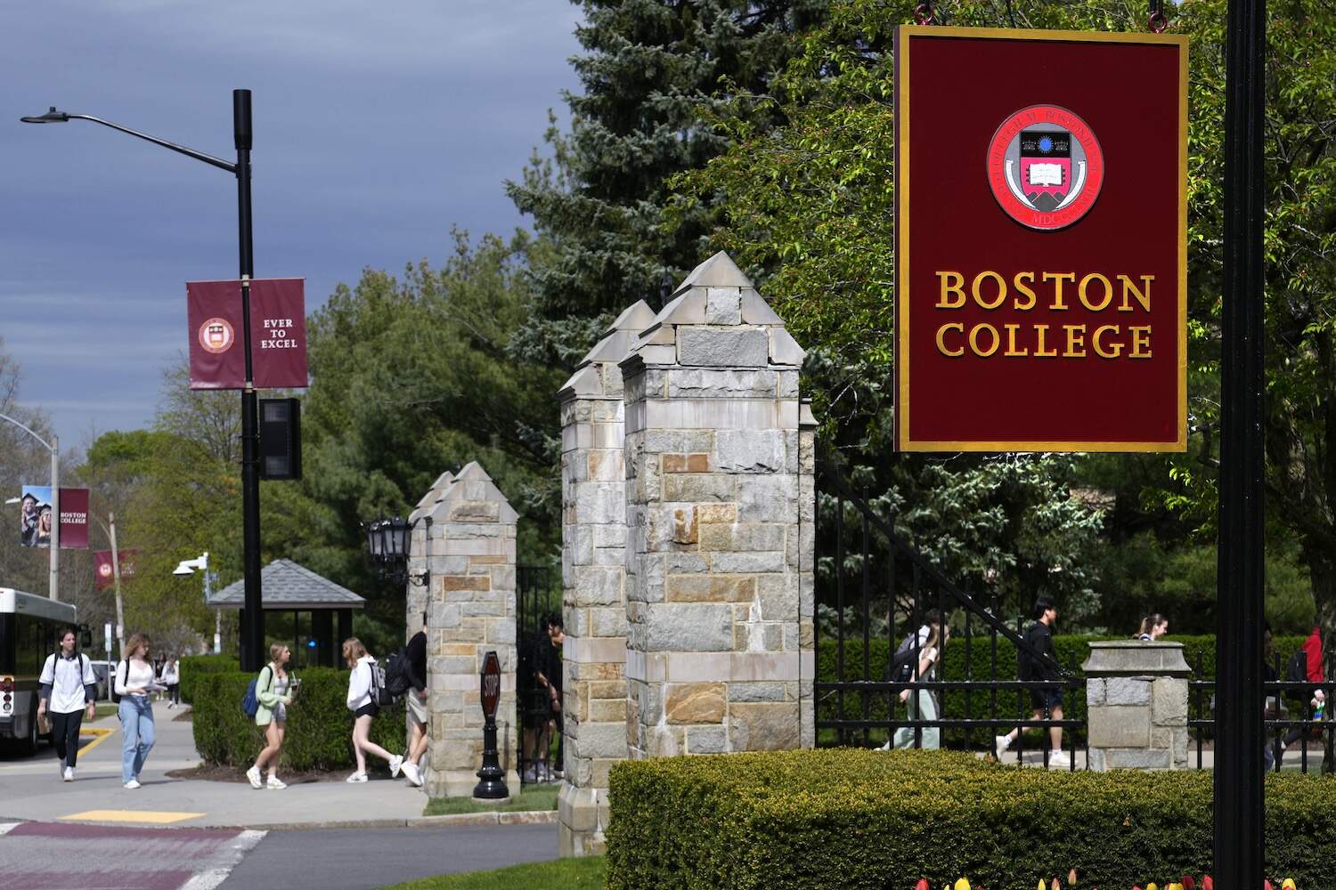 Students walk on the campus of Boston College, Monday, April 29, 2024, in Boston. While many colleges and universities in the Boston area have been scenes of encampments and arrests, Boston College has been relatively quiet. (Charles Krupa/AP)
