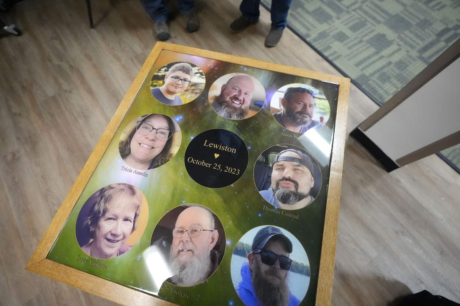 The eight people who were killed last October while bowling at Just In Time Recreation are memorialized on a table top at the bowling alley, Wednesday, May 1, 2024, in Lewiston, Maine. (Robert F. Bukaty/AP)
