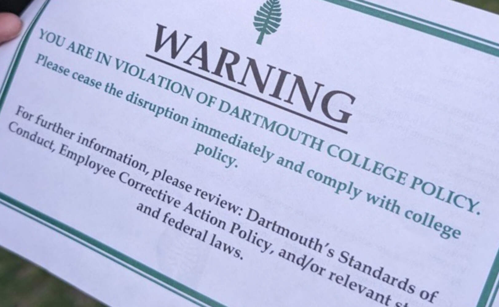 Copies of the fliers distributed at Wednesday's protest. (Olivia Richardson/NHPR)