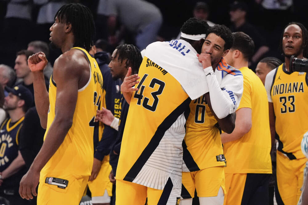 Indiana Pacers forward Pascal Siakam (43) and guard Tyrese Haliburton (0) celebrate following Game 7 in an NBA basketball second-round playoff series against the New York Knicks, Sunday, May 19, 2024, in New York. (Julia Nikhinson/AP)