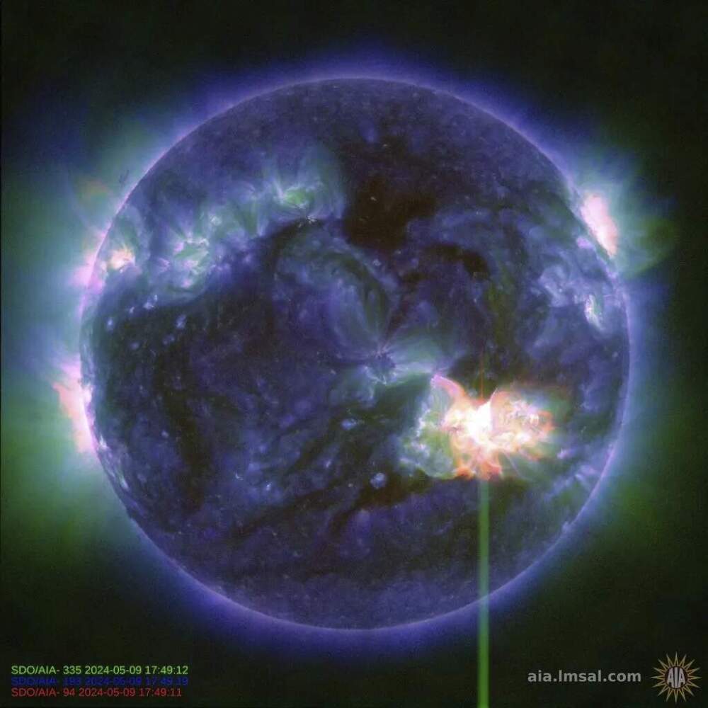 This image provided by NASA shows a solar flare, as seen in the bright flash in the lower right, captured by NASA’s Solar Dynamics Observatory on May 9, 2024. A severe geomagnetic storm watch has been issued for Earth starting Friday and lasting all weekend _ the first in nearly 20 years. (NASA/SDO via AP)