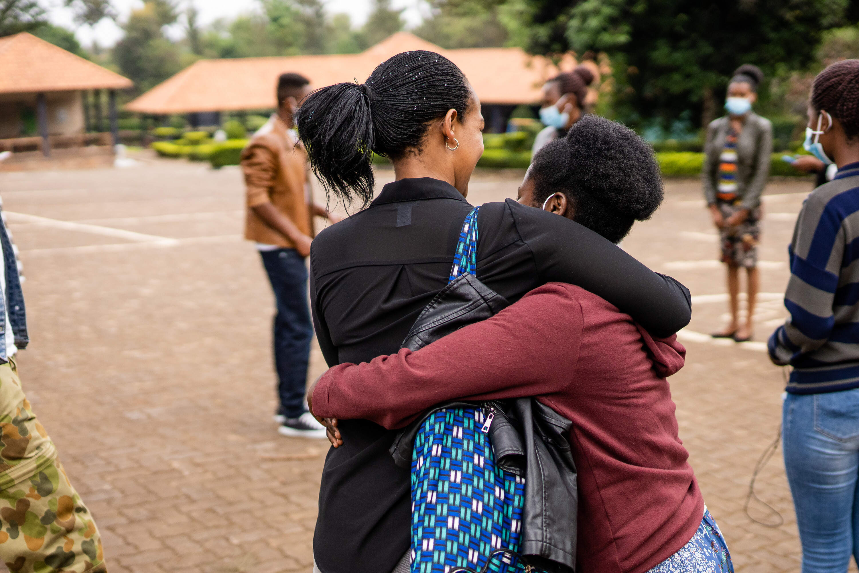 Second-generation survivors born from rapes committed during the 1994 Genocide Against the Tutsi in Rwanda find healing, community, and advocacy at a Foundation Rwanda Counseling Camp. The camps offer participants counseling, career guidance, and reproductive health education. (Serrah Galos/ Foundation Rwanda)