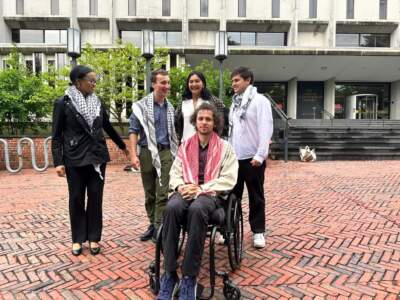 Hisham Awartani joins Brown University students presenting divestment proposal to board members