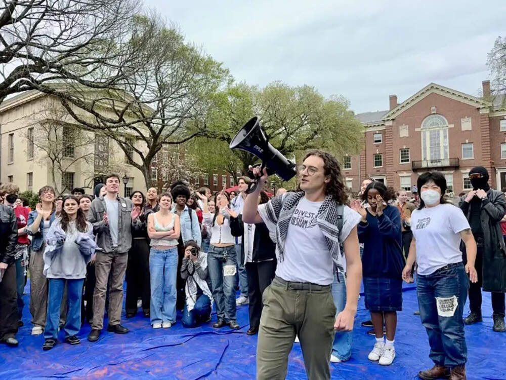 Students at Brown sometimes refer to Awartani as a martyr in speeches, and wear shirts bearing the words Divest for Hisham. (Olivia Ebertz/The Public's Radio)