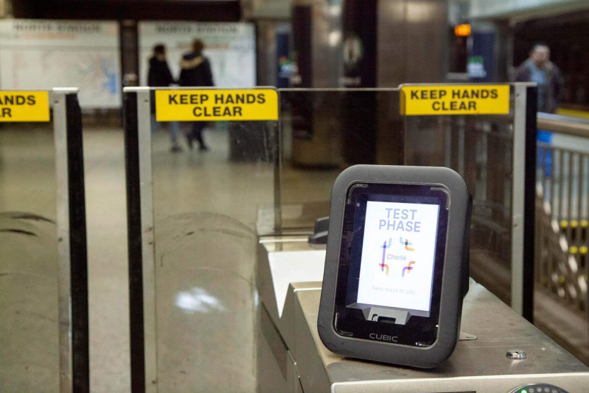 A Cubic fare reader in test mode stands on an MBTA fare gate at North Station on Feb. 12, 2024. (Chris Lisinski/SHNS)