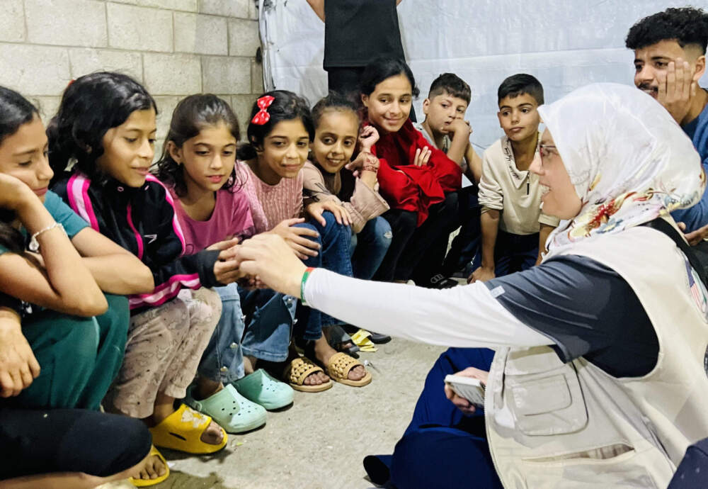 Dr. Jomana Al-Hinti with children in Gaza. (Courtesy of Dr. Jomana Al-Hinti)