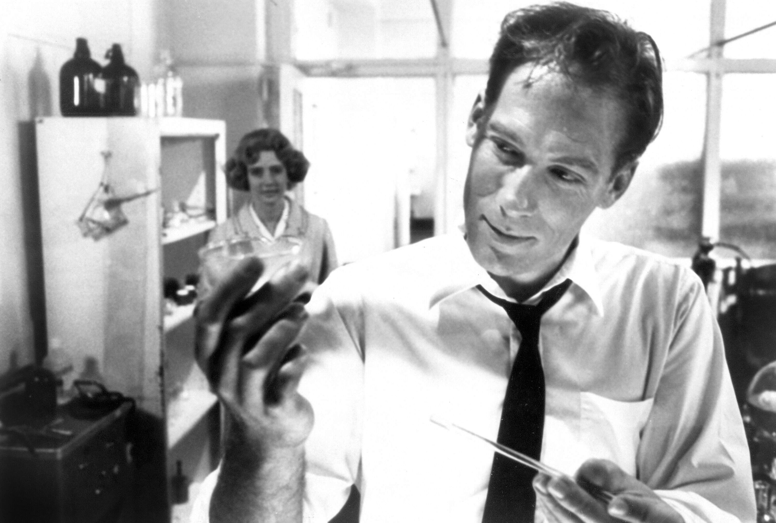 Susan Norman (background) and Larry Maxwell in director Todd Haynes' 1991 film "Poison." (Courtesy Zeitgeist/Photofest)