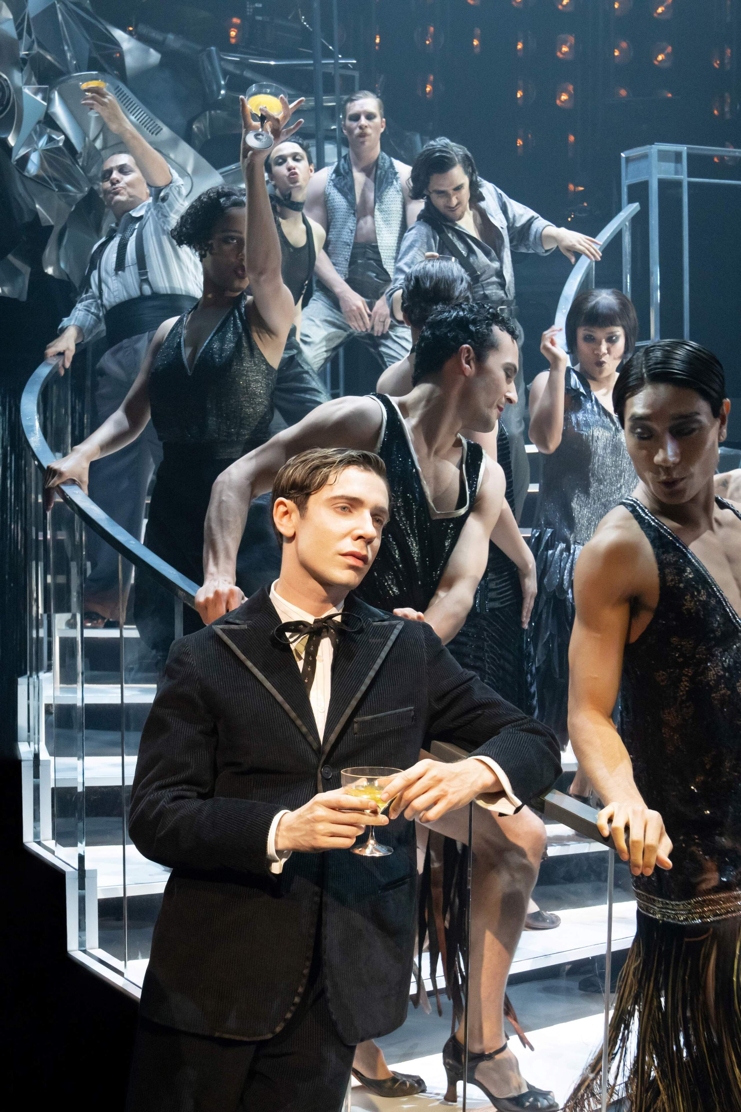 Ben Levi Ross and members of the ensemble in the A.R.T. world premiere of "Gatsby." (Courtesy Julieta Cervantes)