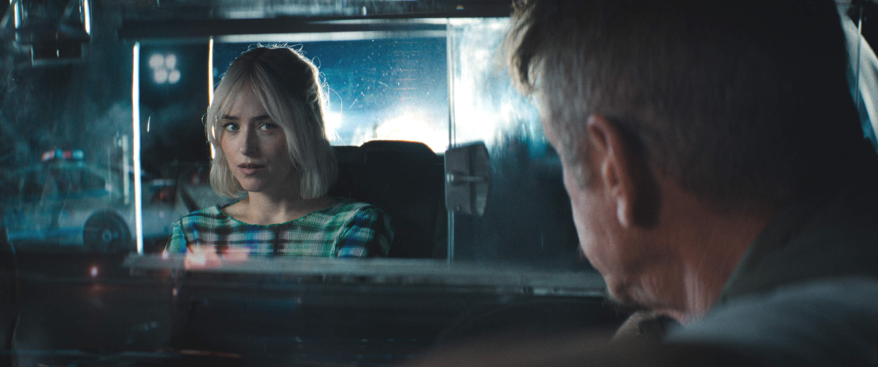 Dakota Johnson (left) and Sean Penn in director Christy Hall’s “Daddio." (Courtesy Phedon Papamichael/Sony Pictures Classics)