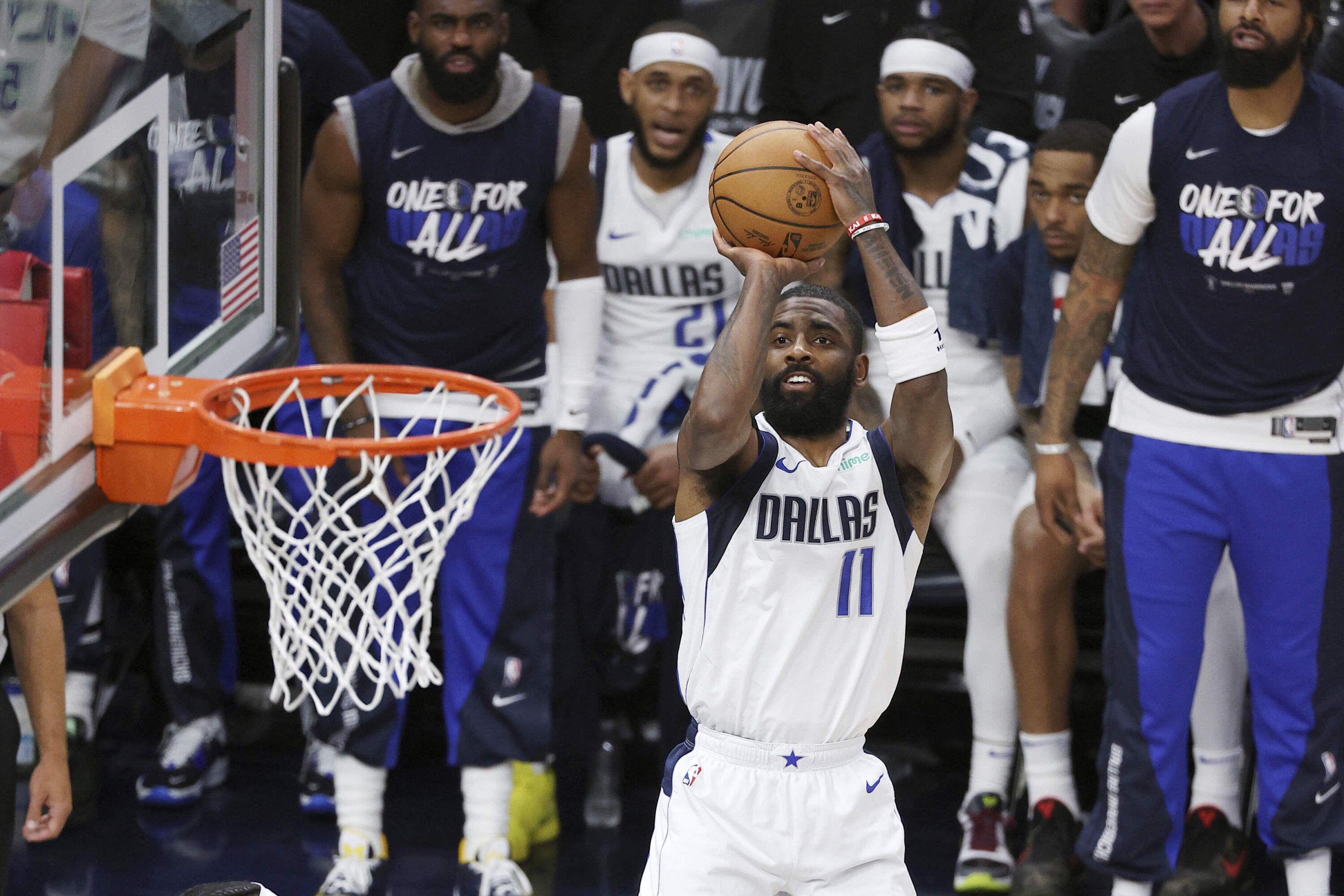 Kyrie Irving, point guard for the Dallas Mavericks, shoots in game five of the Western Conference final. (Matt Krohn/AP)