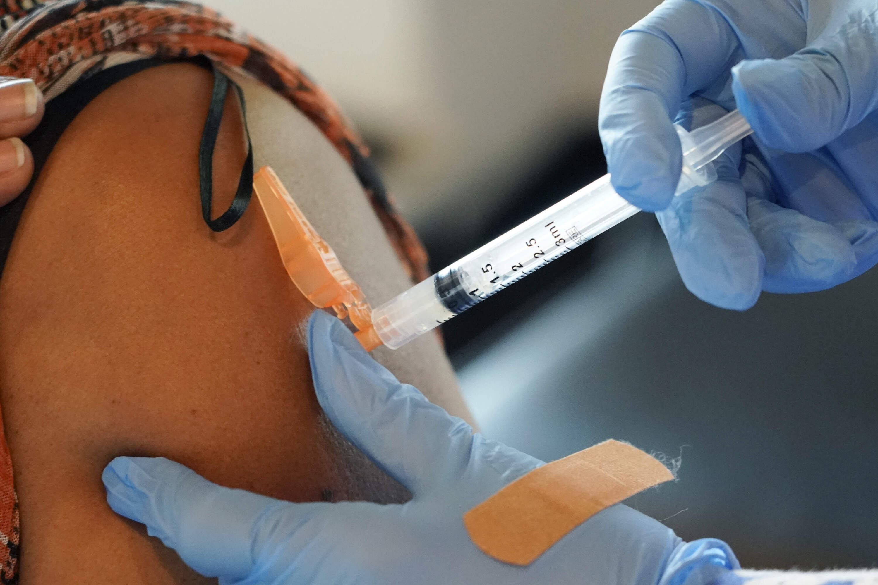A woman receives a COVID-19 vaccine. (Rogelio V. Solis/AP)
