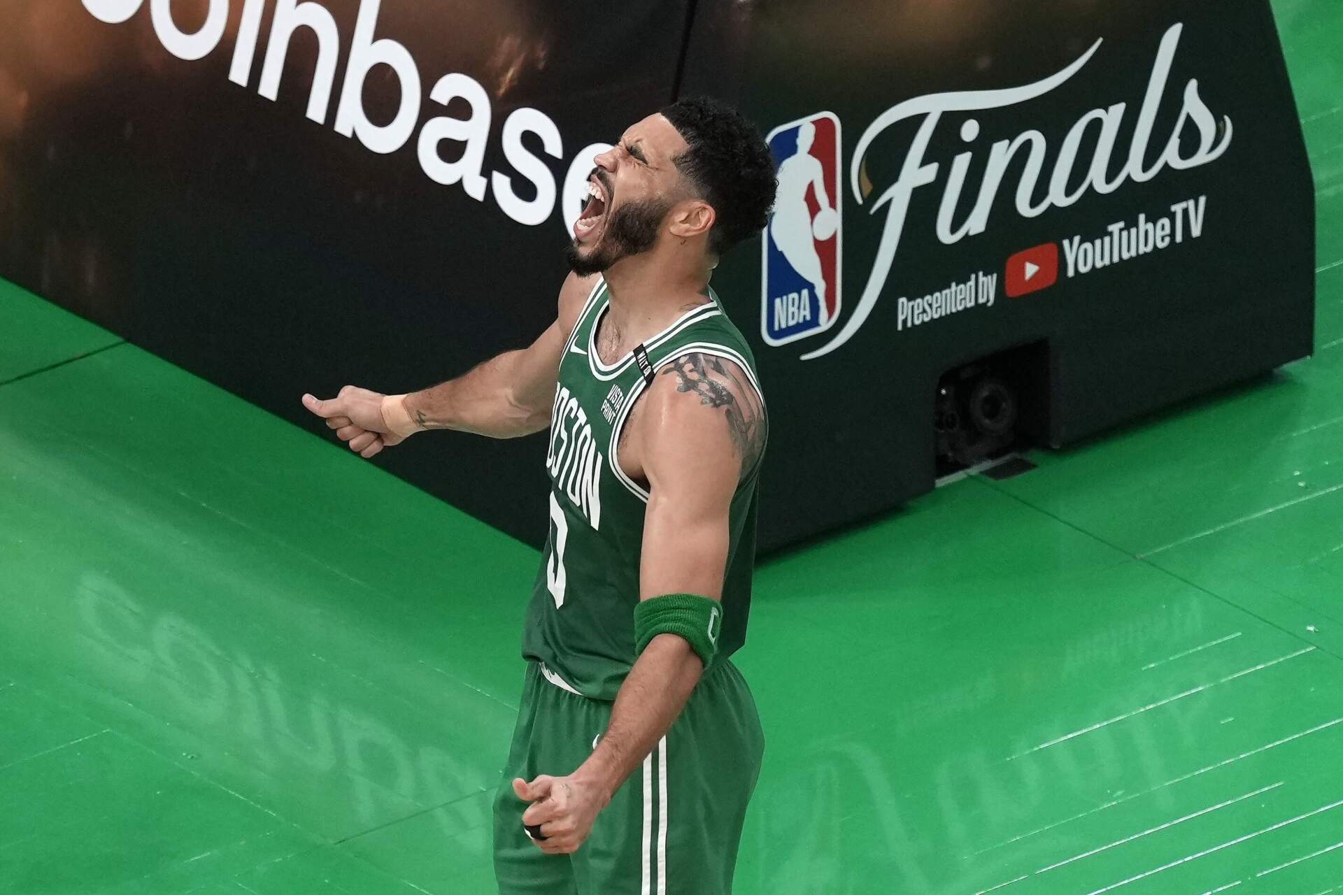 Boston Celtics' Jayson Tatum celebrates after scoring during the first half of Game 5 of the NBA basketball finals against the Dallas Mavericks, Monday, June 17, 2024, in Boston. (Michael Dwyer/AP)