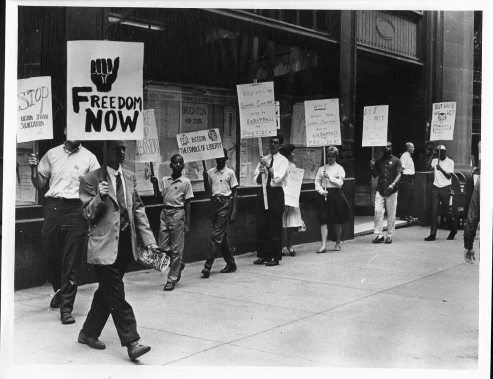 Multi-racial picket line outside the Boston School Committee headquarters in the summer of 1963. (Northeastern University Library)