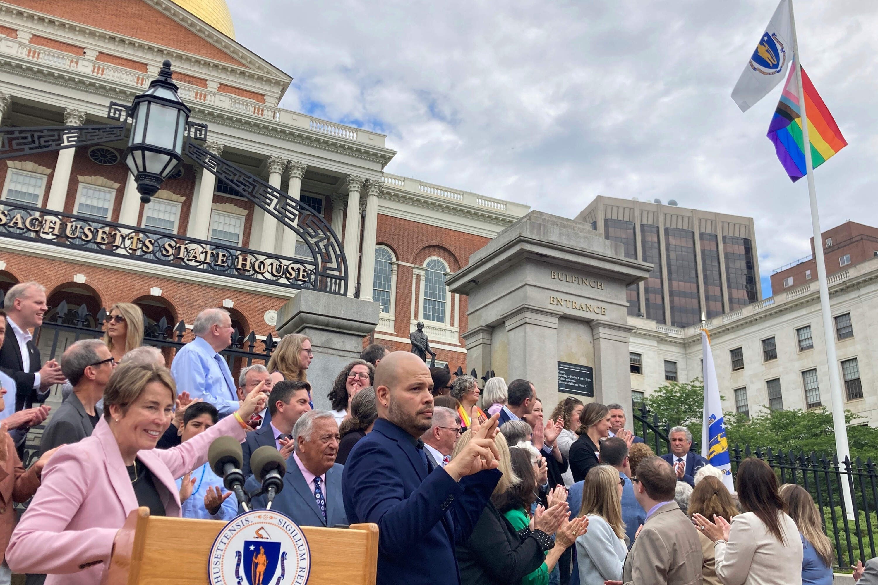 Gov. Maura Healey, left, joined lawmakers and members of the LGBTQ community last week to mark Pride month in front of the Massachusetts State House in Boston. (Steve LeBlanc/AP) Gov. Maura Healey, left, joined lawmakers and members of the LGBTQ community last week to mark Pride month in front of the Massachusetts State House in Boston. (Steve LeBlanc/AP)