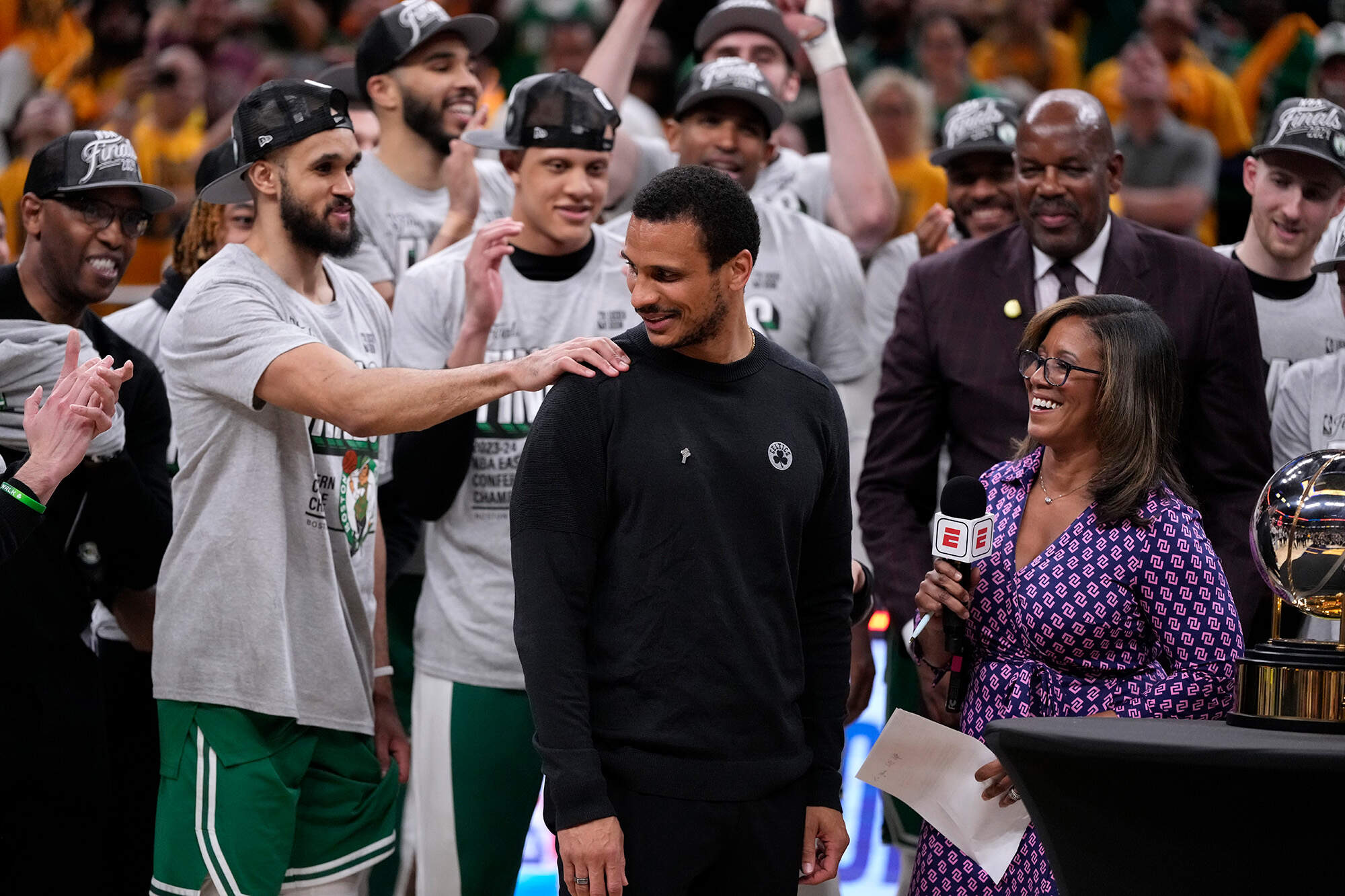 Boston Celtics head coach Joe Mazzulla, center, celebrates with his team after Game 4 of the NBA Eastern Conference basketball finals against the Indiana Pacers, Monday, May 27, 2024, in Indianapolis. (Michael Conroy/AP)
