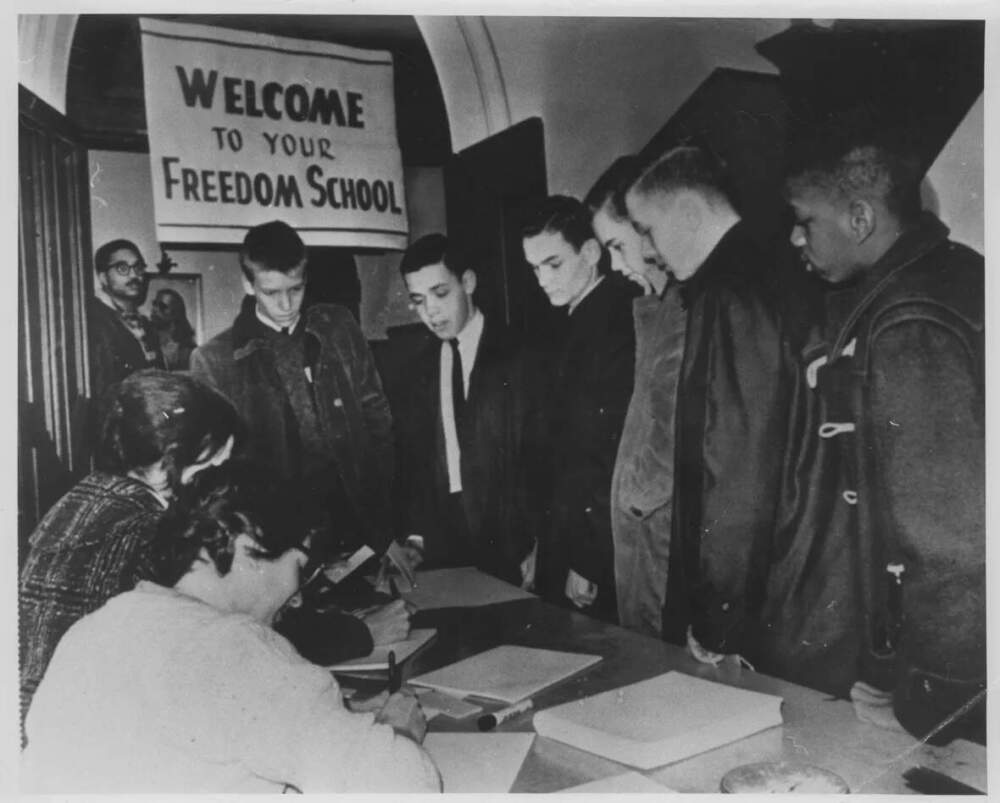Students checking-in at the Tremont St. Methodist Church Freedom School that was hosted to support students participating in the boycott on Freedom Stay-Out Day, February 26, 1964. (Northeastern University Library)