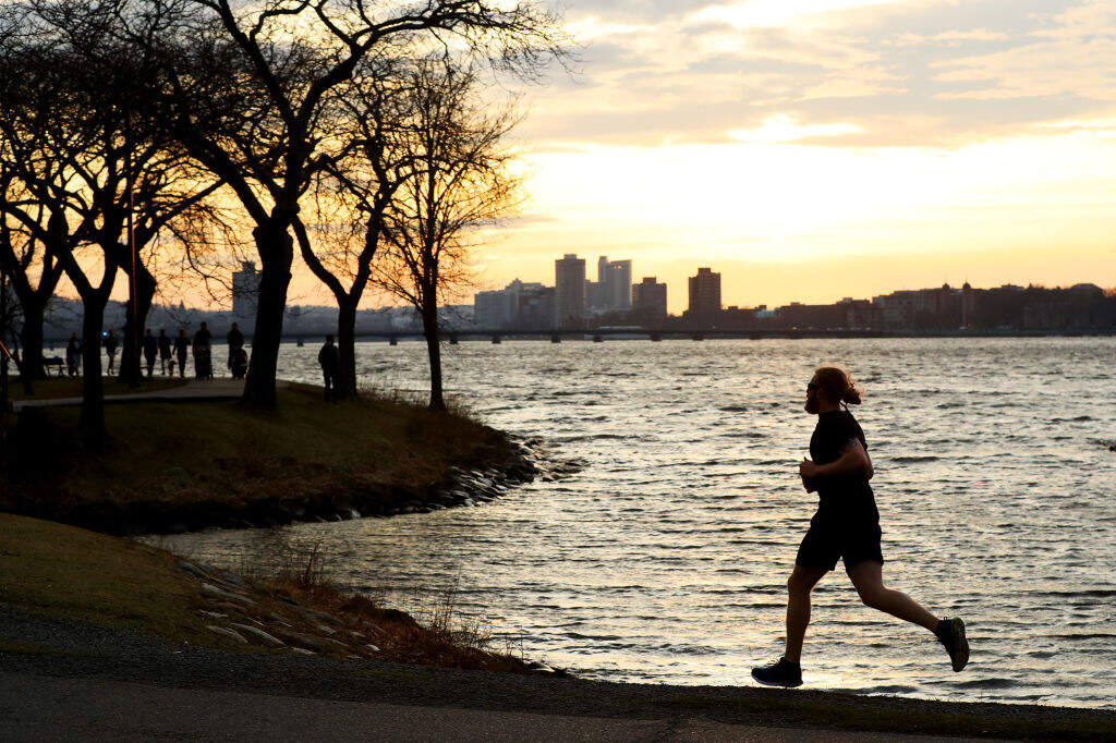 A man runs at the Charles River Esplanade in Boston.  (Maddie Meyer/Getty Images)