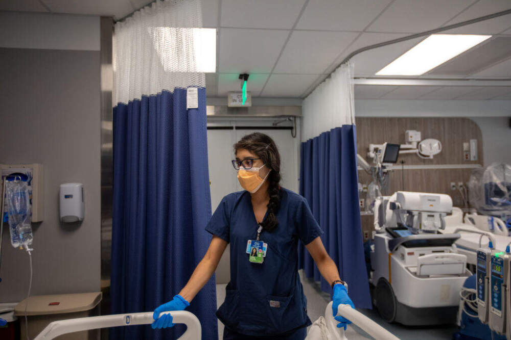 Procurement Transplant Coordinator Cristina Alvarado moves a donor for a CT scan at OneLegacy on June 29, 2023, on in Azusa, CA. (Francine Orr / Los Angeles Times via Getty Images)