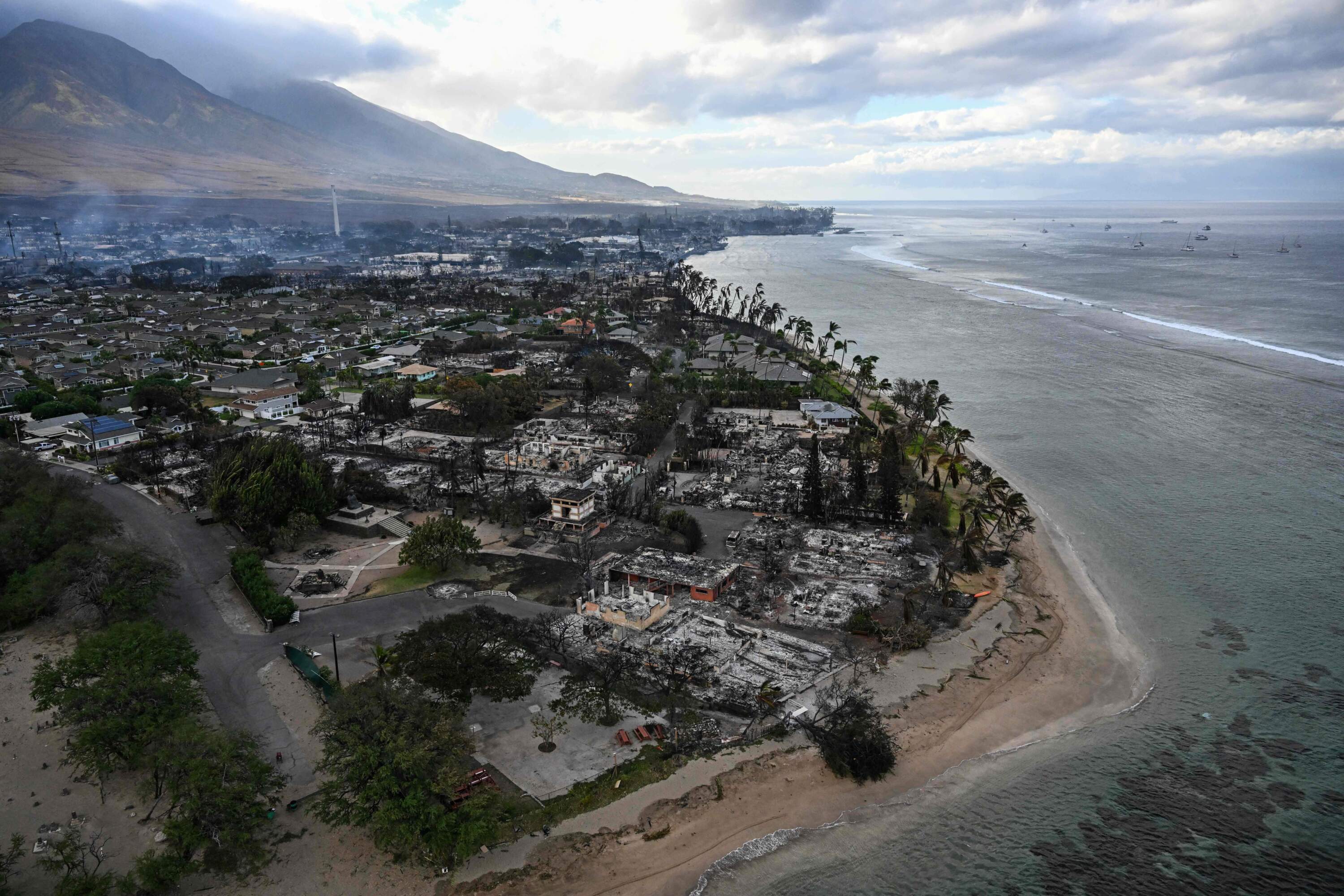 An aerial image taken on Aug. 10, 2023 shows destroyed homes and buildings on the waterfront burned to the ground in Lahaina in the aftermath of wildfires in western Maui, Hawaii. (Patrick T. Fallon/AFP via Getty Images)