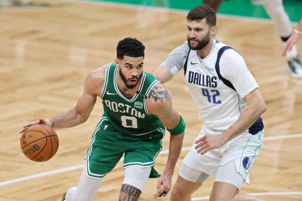 Jayson Tatum #0 of the Boston Celtics handles the ball against Maxi Kleber #42 of the Dallas Mavericks during the second quarter of Game Five of the 2024 NBA Finals at TD Garden on June 17, 2024 in Boston, Massachusetts. (Adam Glanzman/Getty Images)