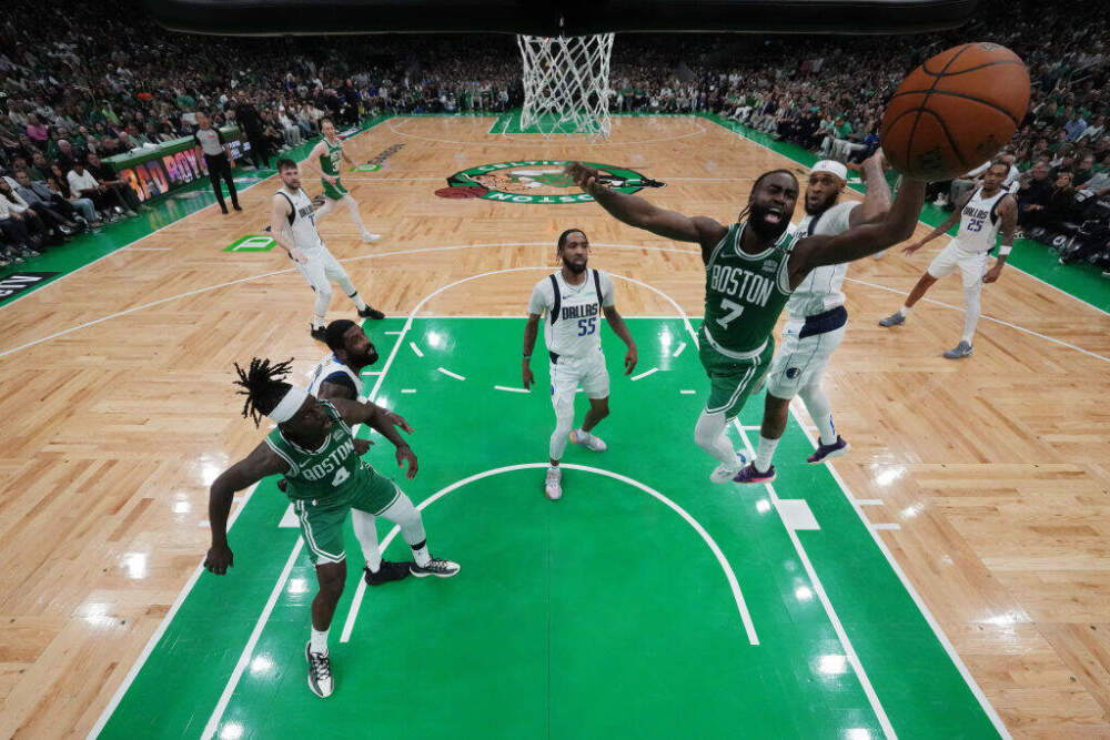 Jaylen Brown #7 of the Boston Celtics grabs a rebound over Daniel Gafford #21 of the Dallas Mavericks during the third quarter of Game 5 of the 2024 NBA Finals at TD Garden on June 17, 2024 in Boston, Massachusetts. (Peter CaseyGetty Images)