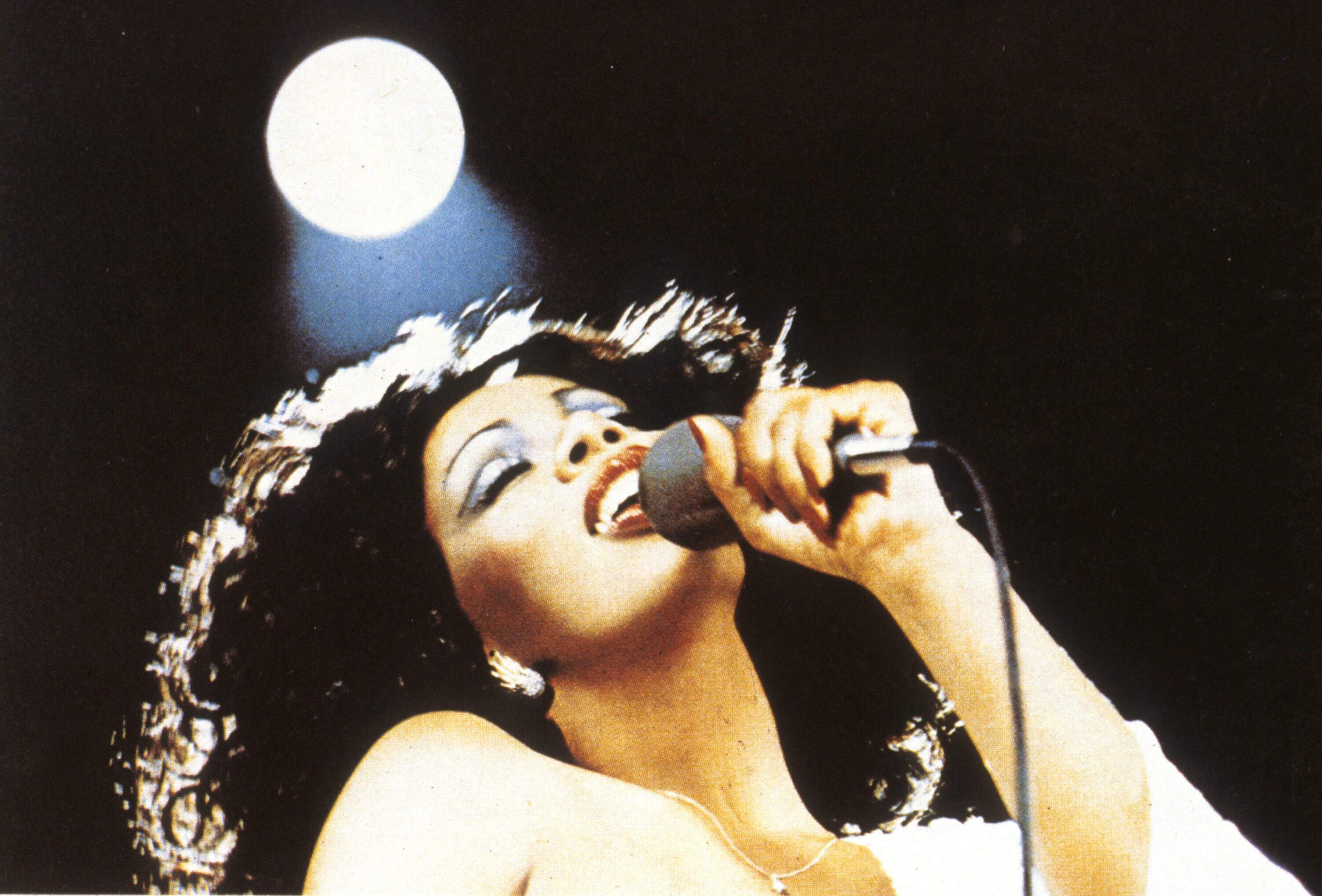 Donna Summer performs on stage, circa 1975. (GAB Archive/Redferns)