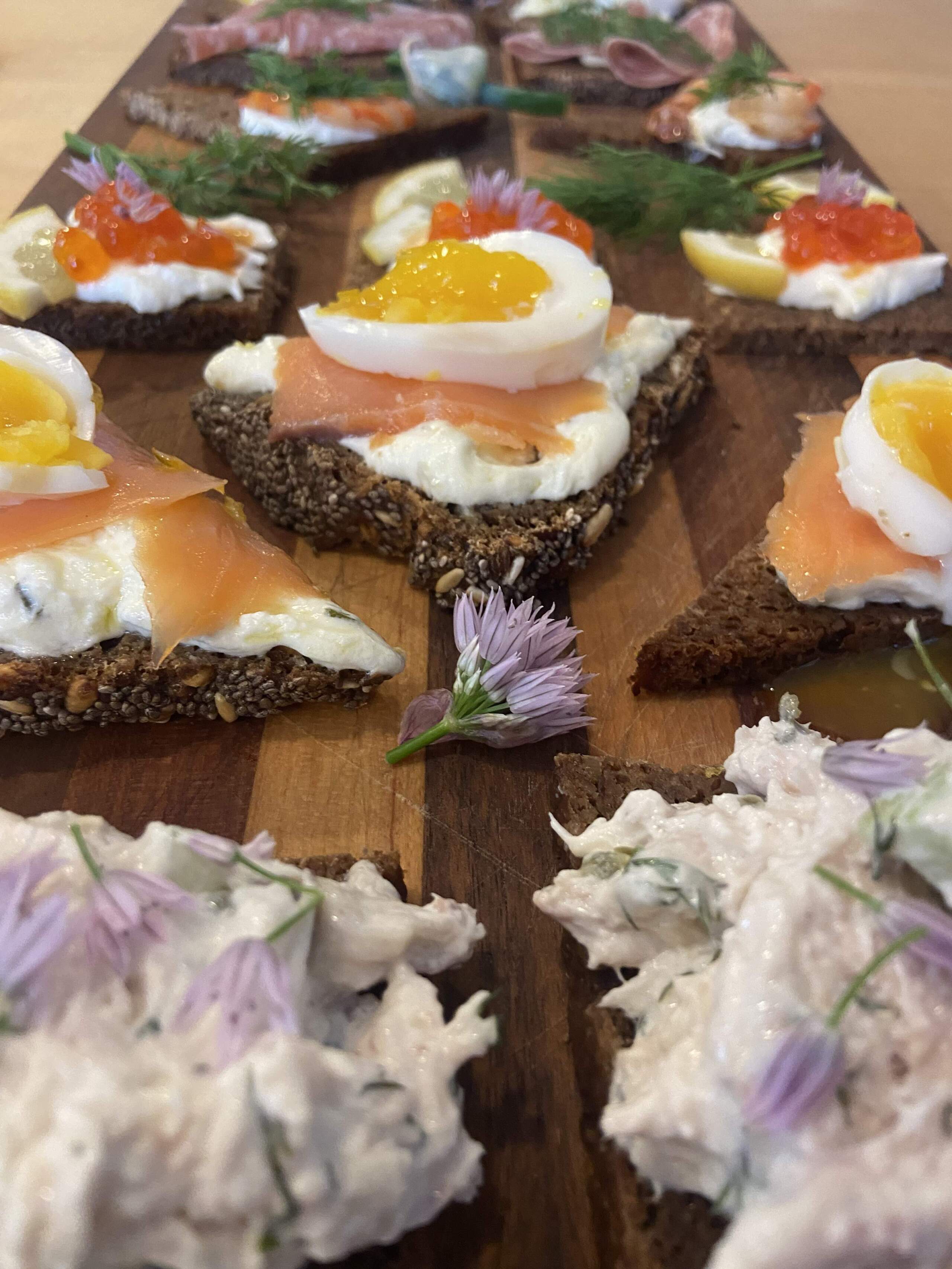Soft-boiled eggs and chicken salad atop smørrebrød. (Kathy Gunst/Here & Now)