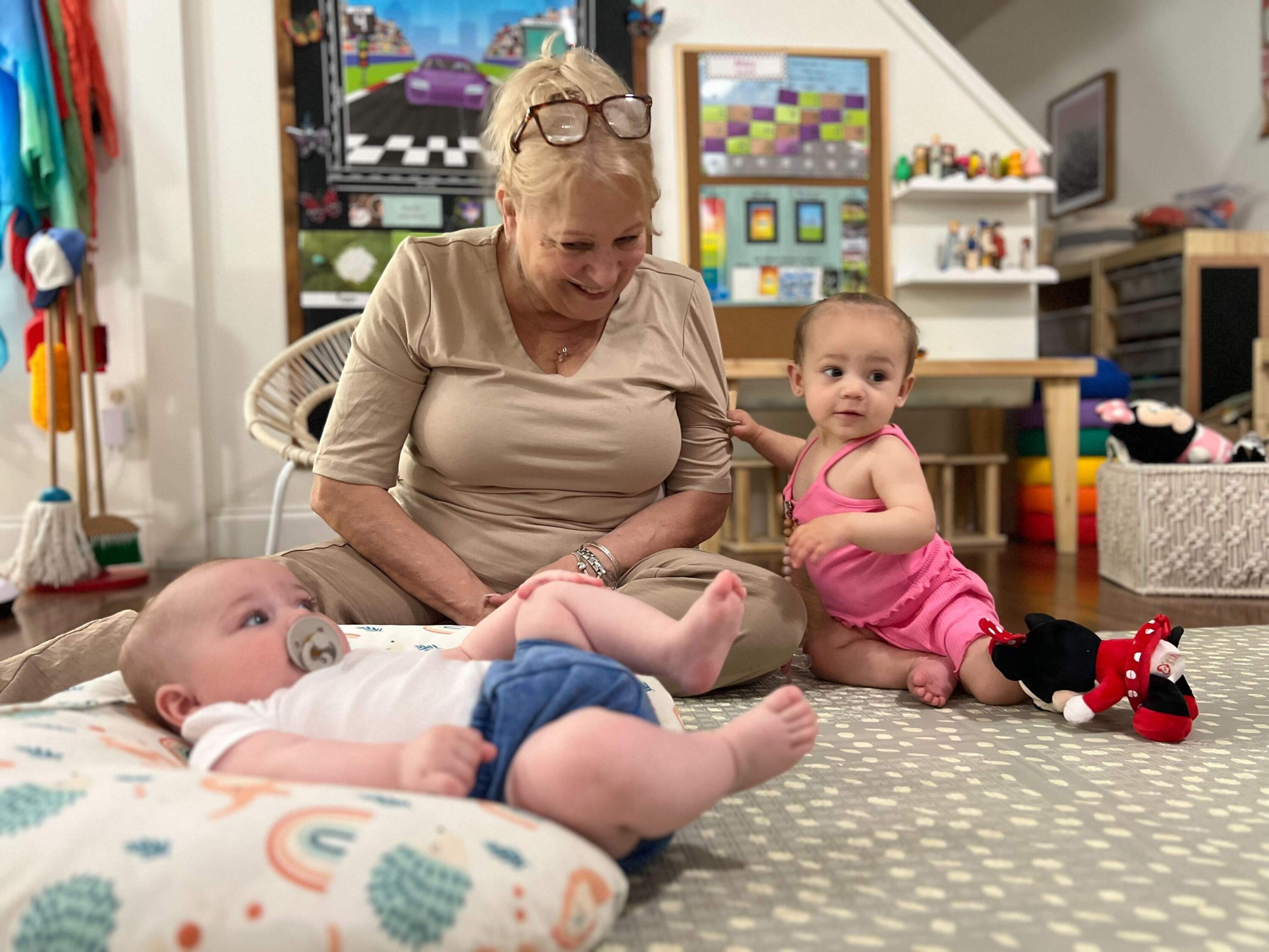 Jessica Paselli's mom Rosie helps out at her child care business. (Ashley Locke/Here &amp; Now)