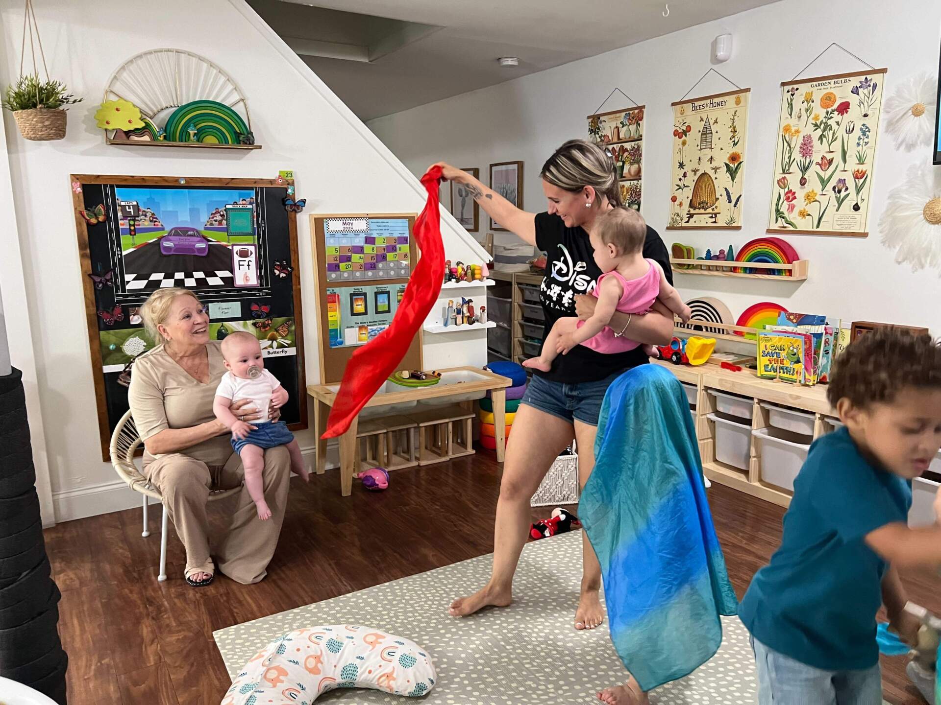 Child care providers like Jessica Paselli (right) and her mother Rosie (right) have been receiving grants of more than $1,000 per month to keep their businesses thriving. (Ashley Locke/Here &amp; Now)