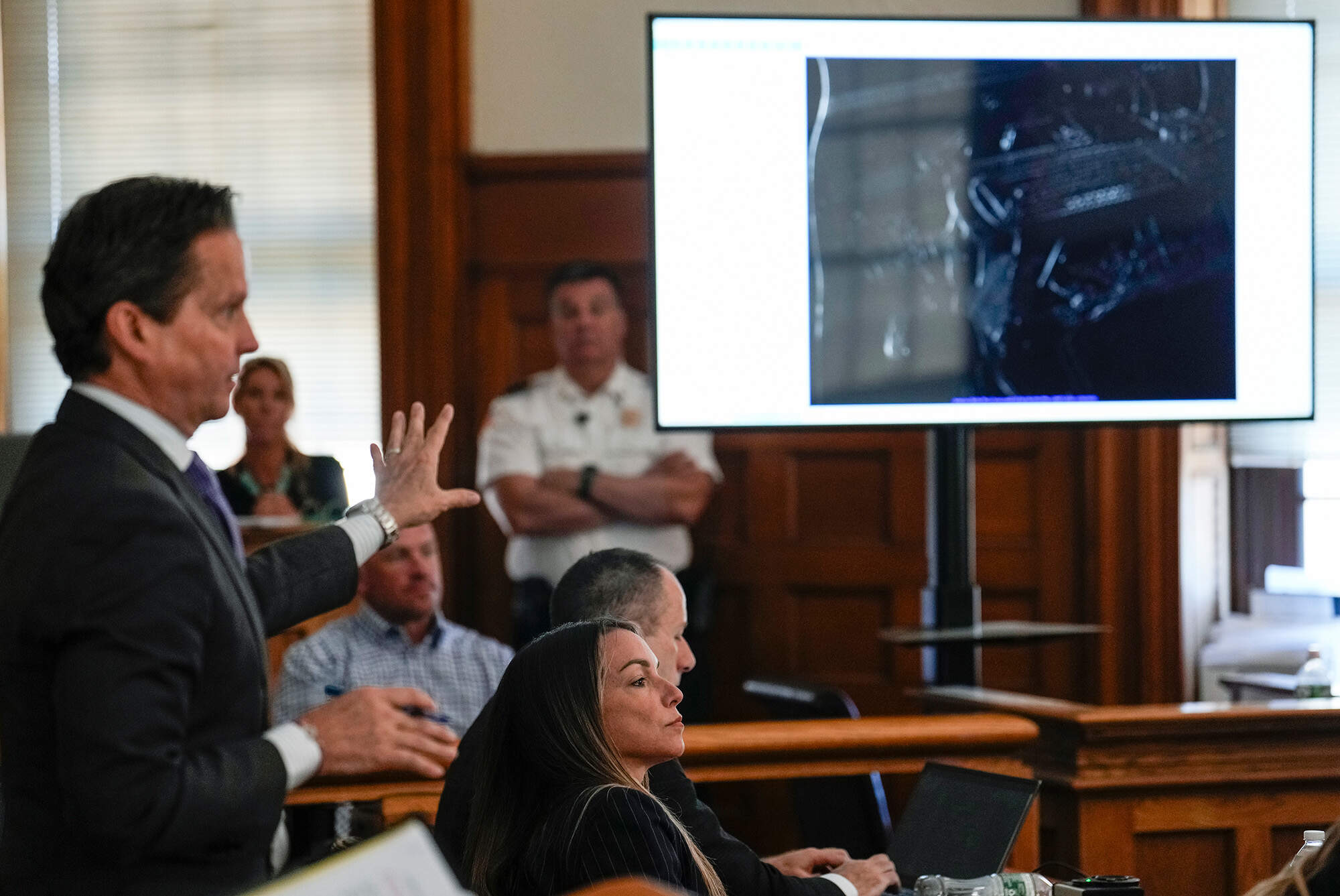 Karen Read, below center, is seated as evidence is presented, Monday, June 10, 2024, in Norfolk Super Court, in Dedham, Mass. (Kayla Bartkowski/The Boston Globe via AP)