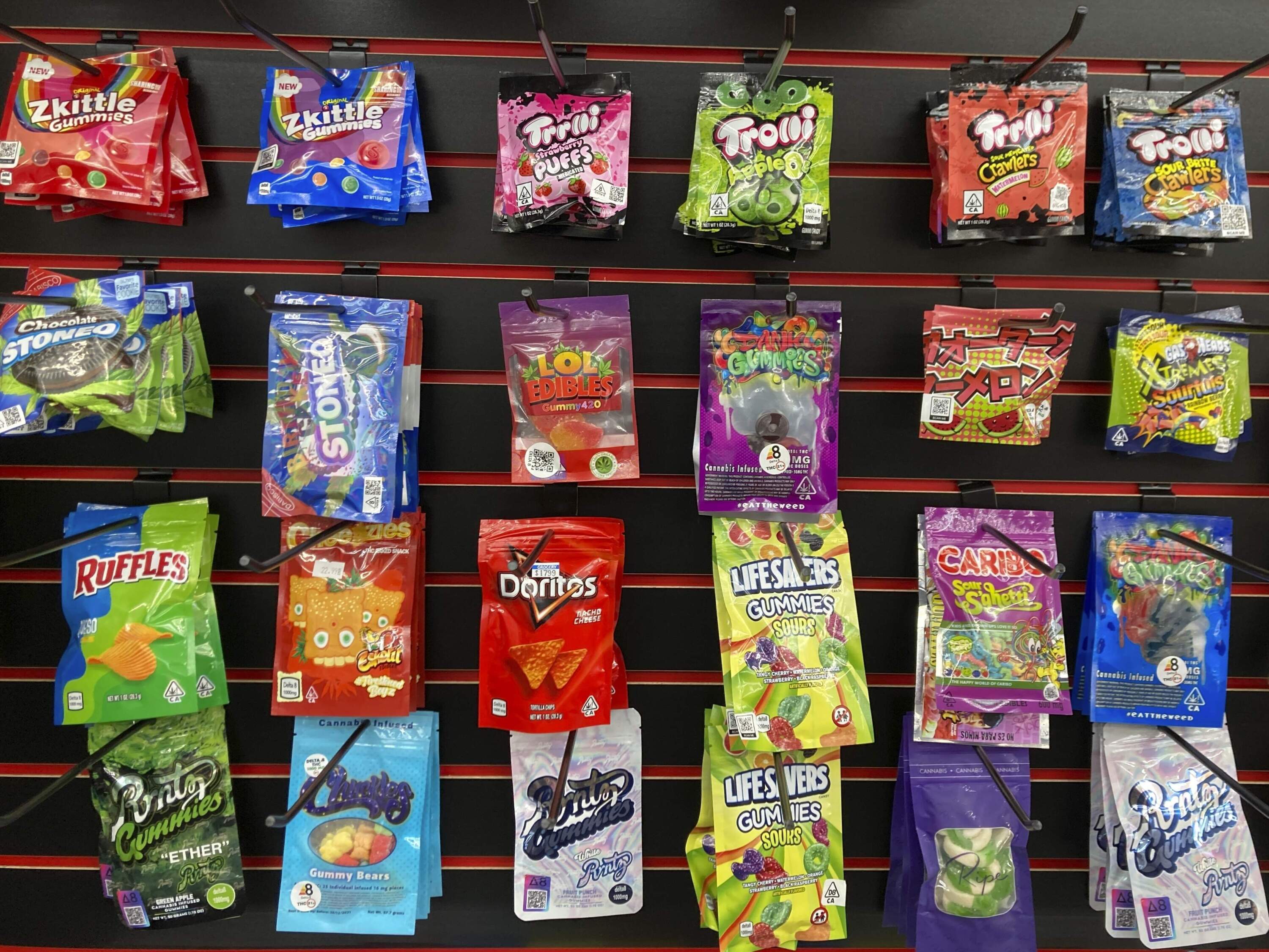 An array of products advertised as containing synthetically derived delta-8 THC is offered for sale at a smoke shop in Seattle. (Gene Johnson/AP)