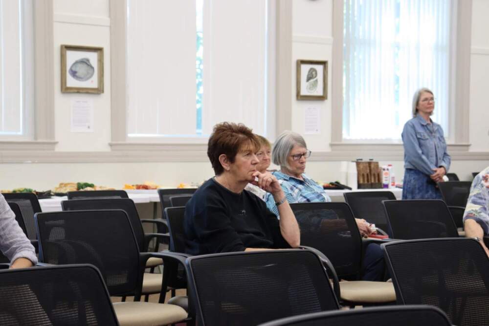 Community members listen to Schaider's presentation. (Eve Zuckoff/CAI) 