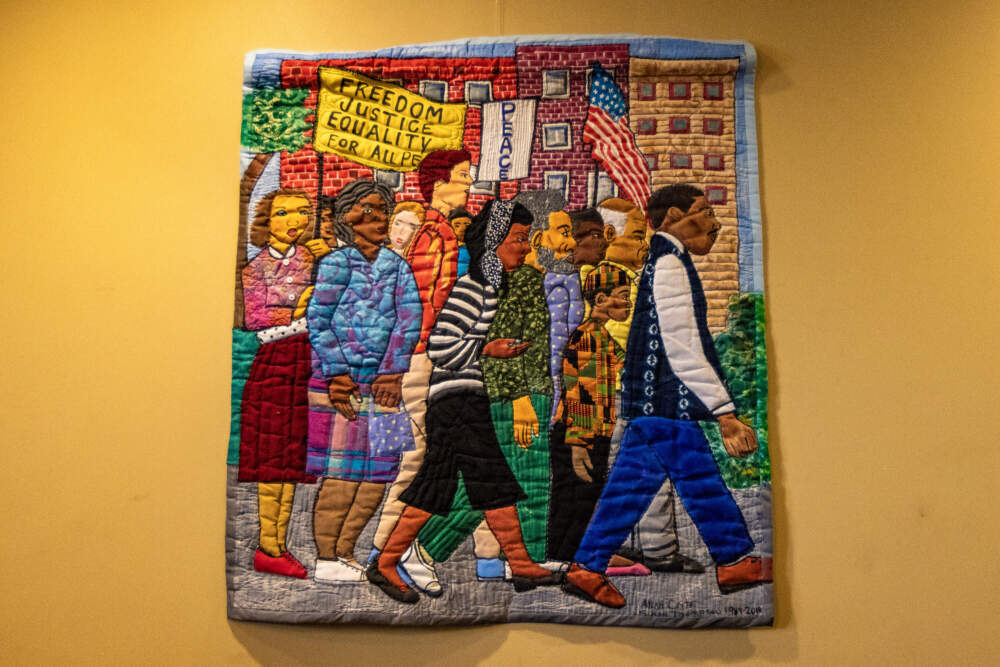 A quilt by Susan Thompson on display at the Hyde Park branch of the Boston Public Library. (Jesse Costa/WBUR)