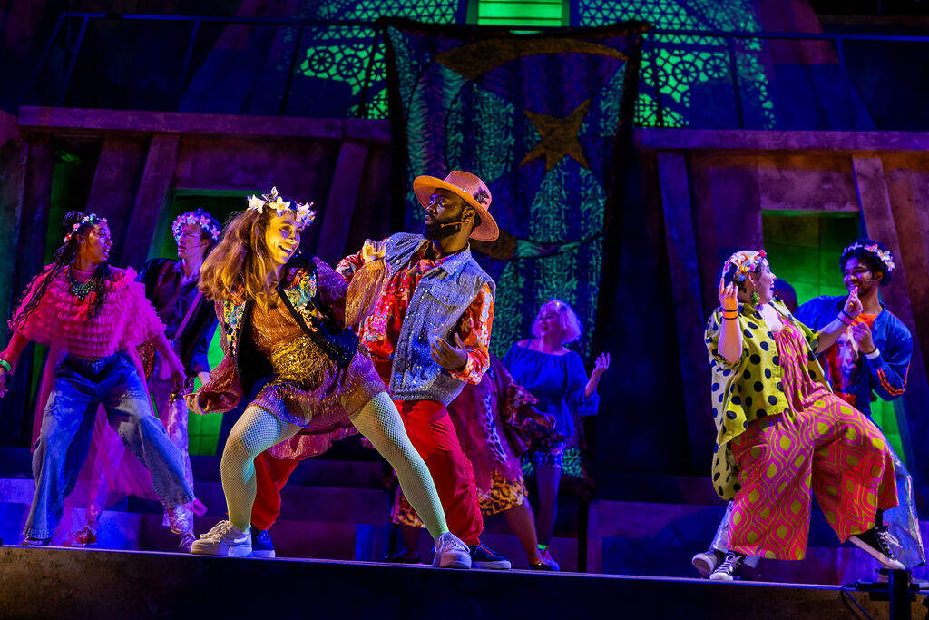 Clara Hevia and Joshua Olumide (center) in Commonwealth Shakespeare Company's production of "The Winter's Tale." (Courtesy Nile Scott Studios)