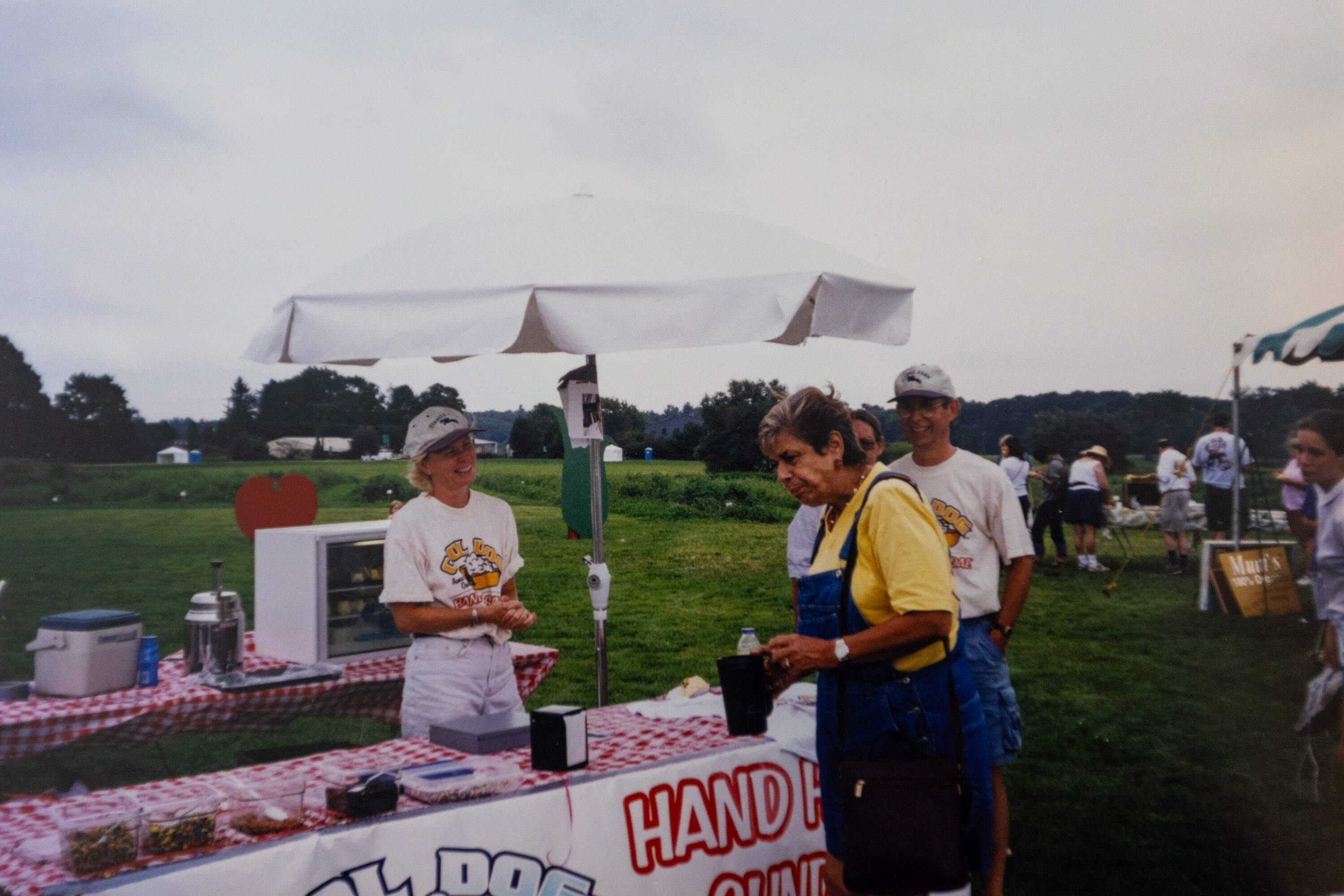 Tara Franklin, left, and Peter Franklin, right, selling Cool Dogs at Verrill Farm in Concord, MA in 2001. (Courtesy Peter and Tara Franklin)