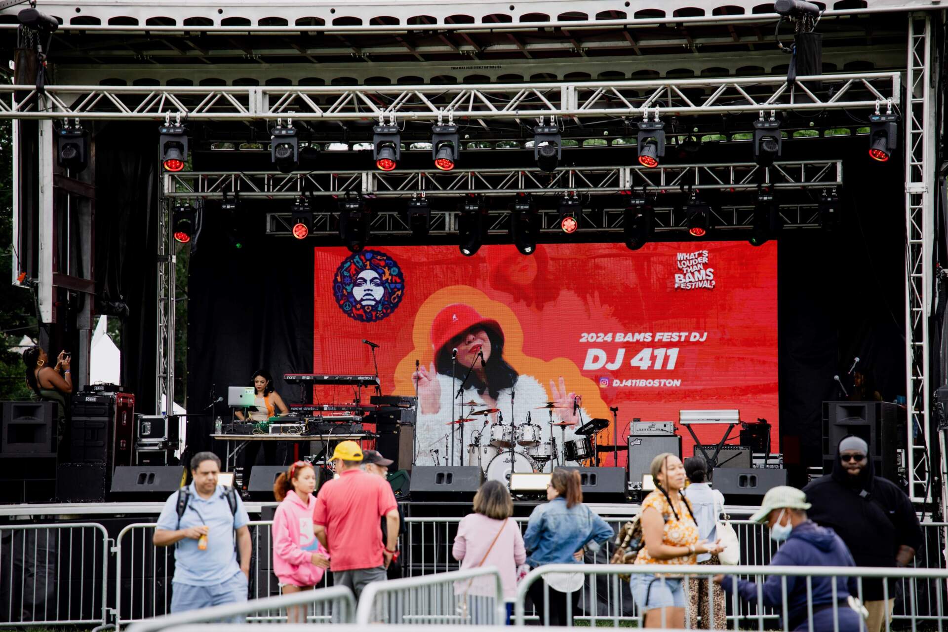 DJ 411 on stage at BAMS Festival 2024.  (Photo by Olivia Moon for WBUR)