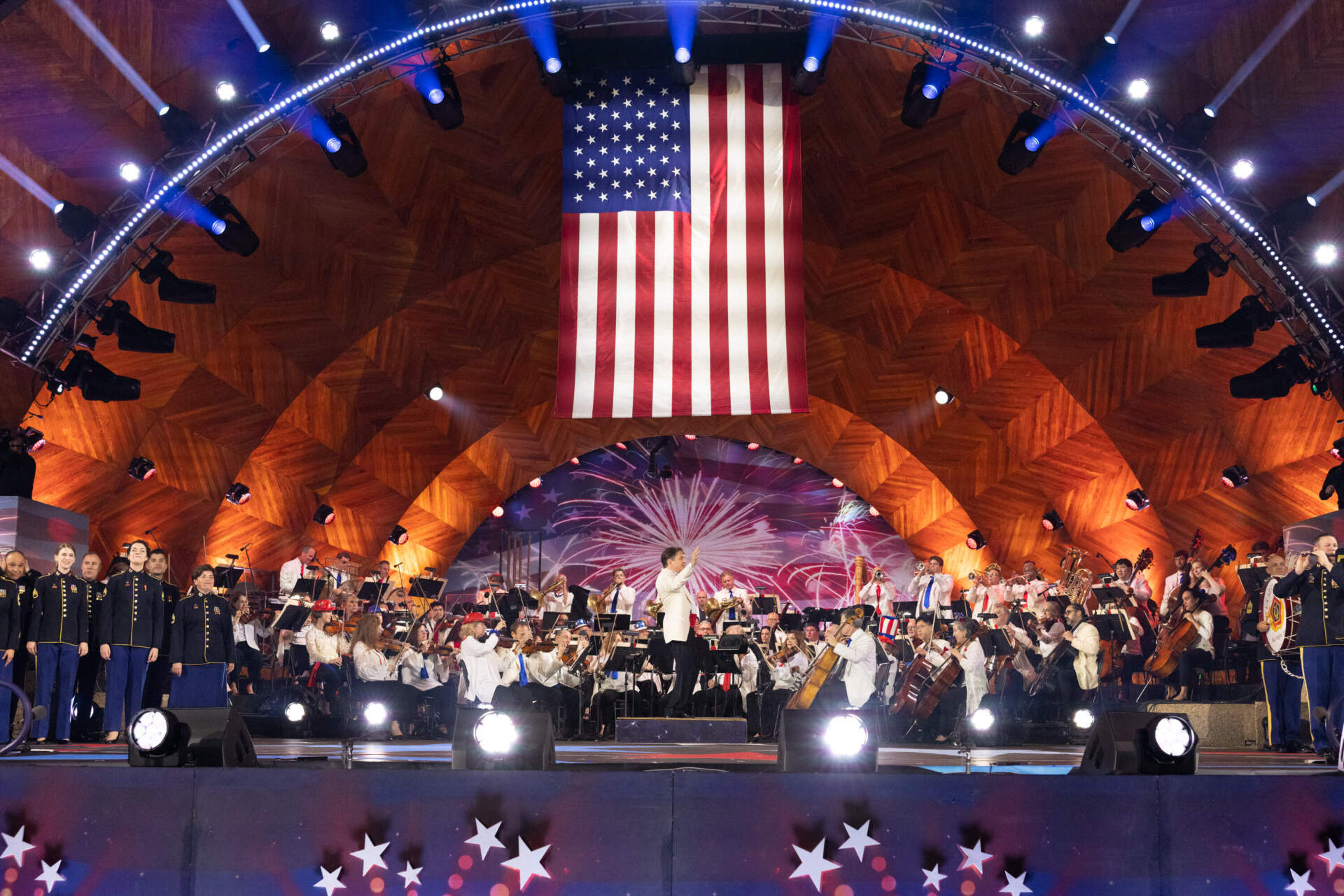 Keith Lockhart and the Boston Pops Esplanade Orchestra performing &quot;The Stars and Stripes Forever&quot; at the 2023 Fireworks Spectacular. (Courtesy Michael Blanchard)