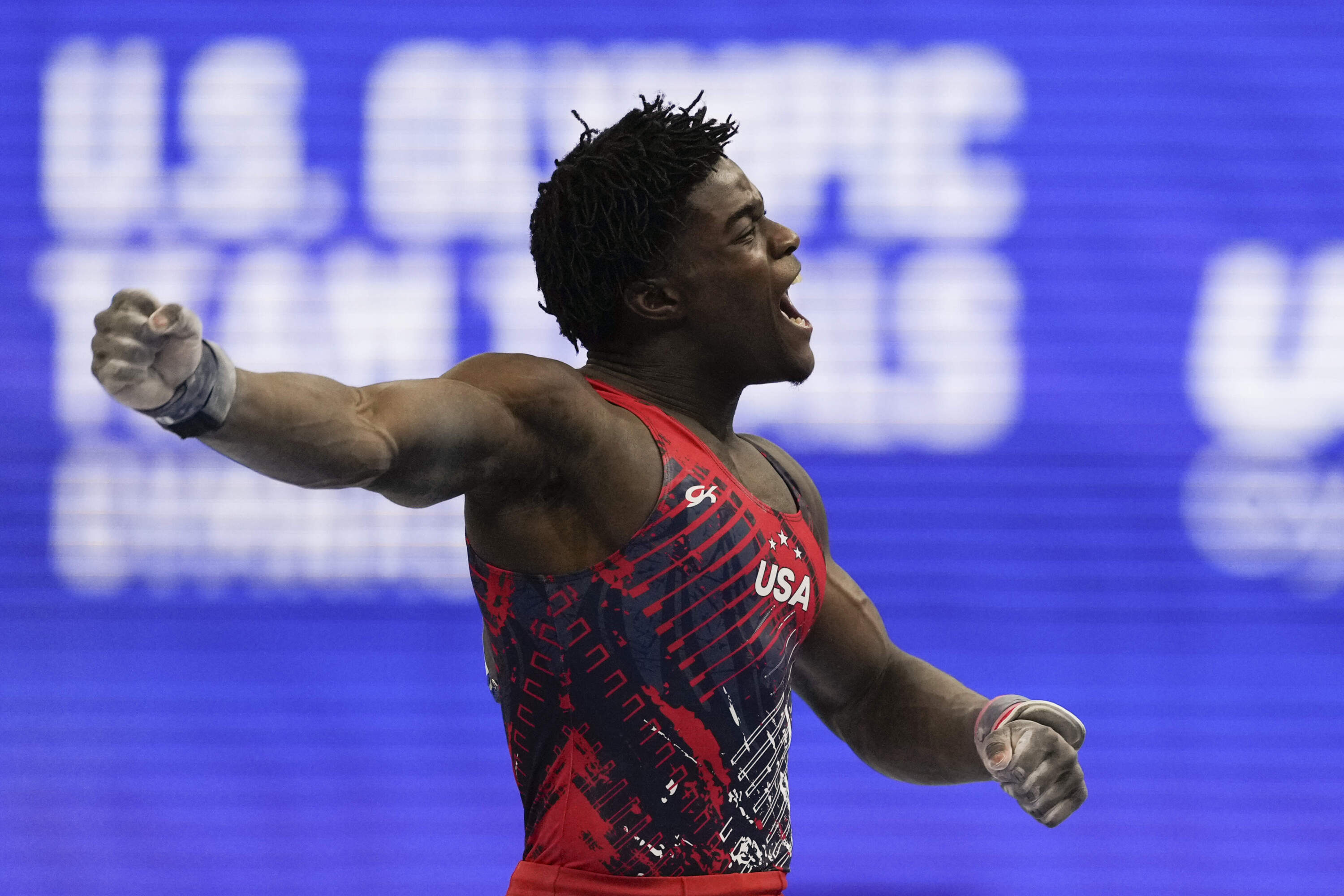 Fred Richard celebrates after competing on the pommel horse at the United States Gymnastics Olympic Trials on Saturday, June 29, 2024, in Minneapolis. (Charlie Riedel/AP)