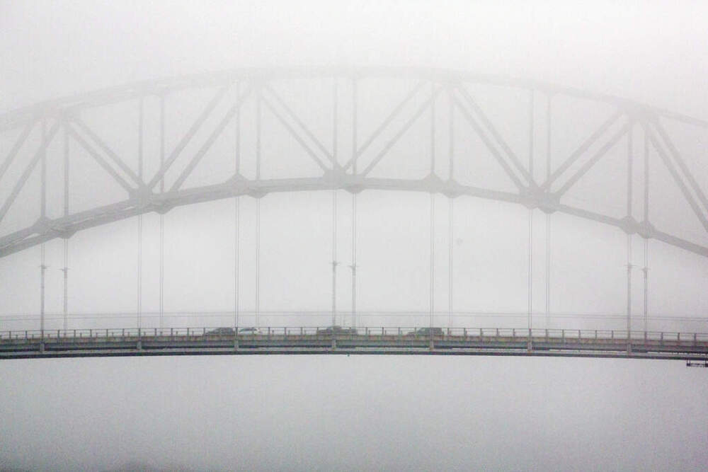 Cars crossing the Sagamore Bridge on a foggy day in 2020. (Michael Dwyer/AP)